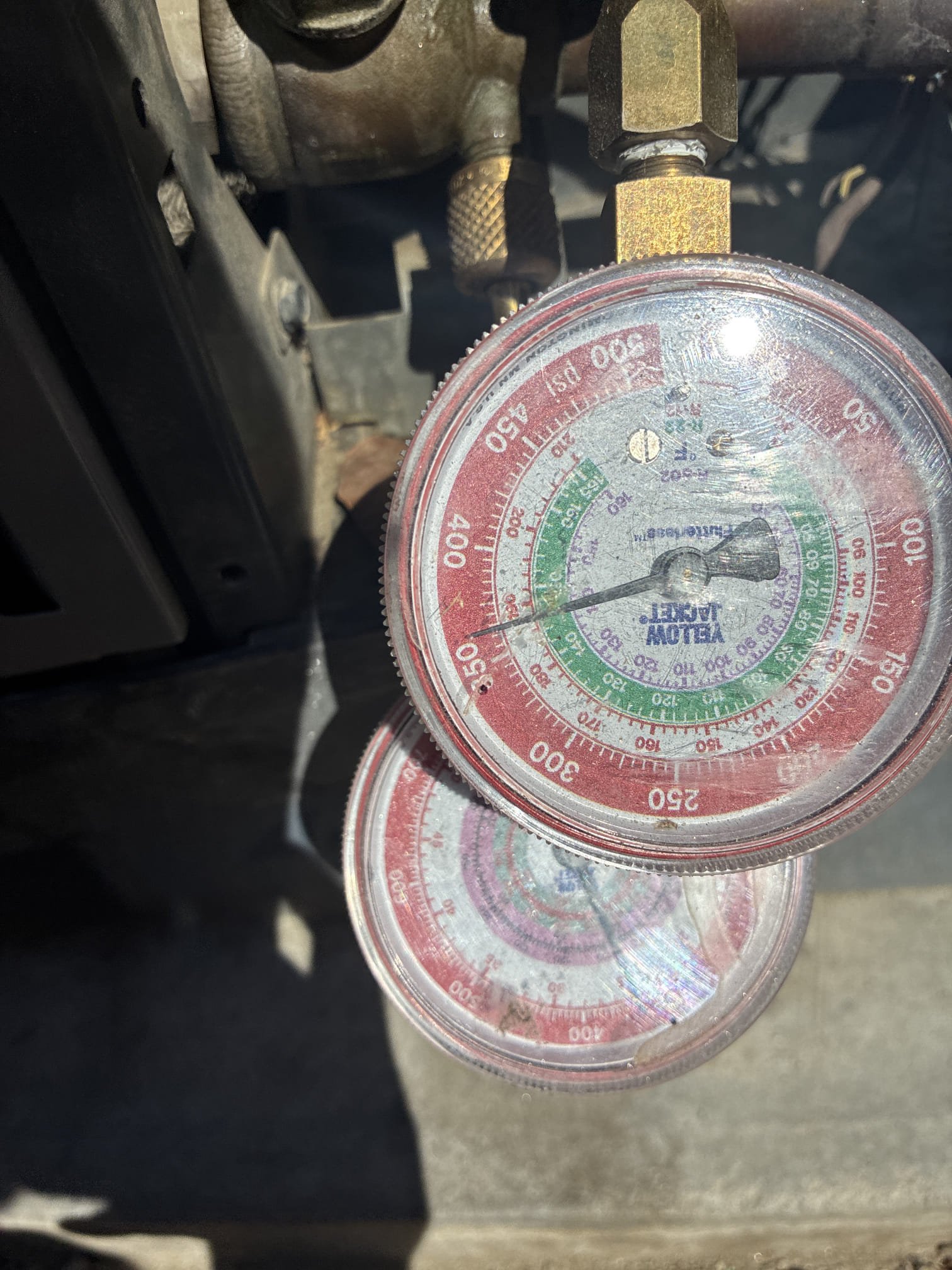 La Quinta, CA - Returned to check on pressure test. Found line set and coil pressure held. Found slight leak in condenser Schrader valve, replaced four Schrader valves. Pulled vacuum and cycled system. System is properly running.