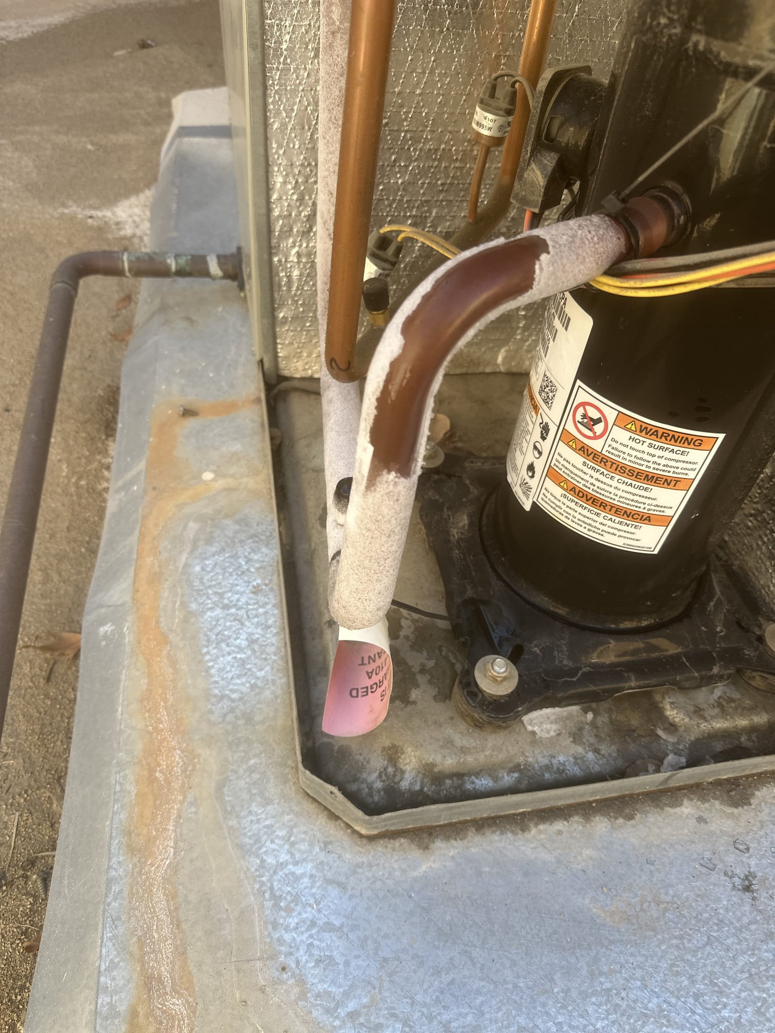 Demand Service Call – Cooling Concern
Equipment Information
Make: Trane
Model: 4YCC4036A1070AB
Serial Number: 173811338L
Manufacture Date: September 2017
Equipment Type: 3-Ton Package Unit
Refrigerant: R-410A
Service Findings and Diagnosis
Upon arrival, member stated that the equipment was not keeping up with the heat load and was intermittently failing to operate. Cycled equipment and found the system short cycling.
Accessed the rooftop and performed further diagnostics. Found equipment iced up. Allowed the equipment to thaw completely before continuing troubleshooting.
Upon further inspection, identified a refrigerant leak at the Schrader valve core. Replaced the leaking Schrader core and added approximately 1 lb of R-410A refrigerant for diagnostic testing. During testing, observed the system rapidly losing pressure, indicating an additional refrigerant leak.
Informed the member of the findings and discussed repair and replacement options. Also reviewed the equipment's age, noting t
