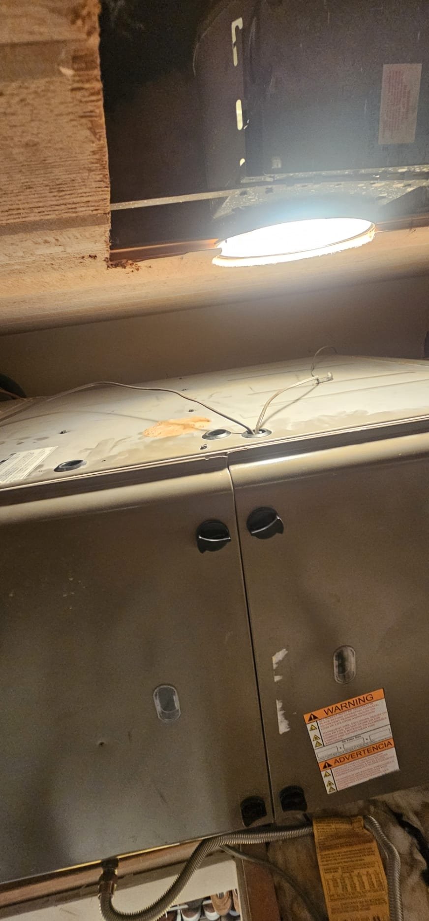 The technician assessed the feasibility of the job and estimated that a full day will be required to replace the coil. Due to space constraints, the return plenum may need to be removed, and it is possible that the entire system will have to be disassembled for the coil replacement.