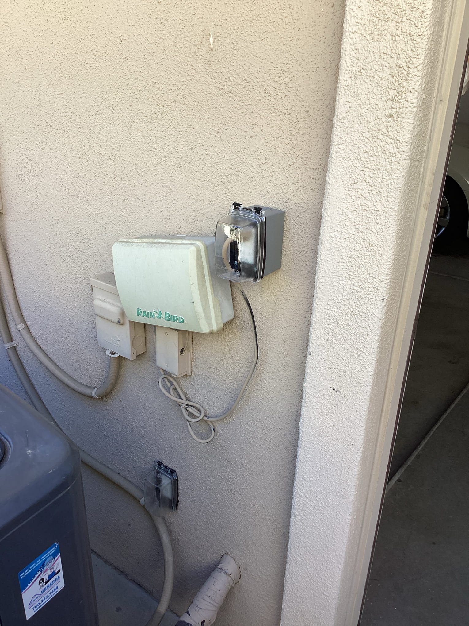 Arrived at customer’s home to install a new gfci outlet with a bubble cover for rainbird system that keeps tripping gfci outlet in home. Penetrated out of the back of the switch box in garage and set an outlet directly behind it on the exterior. This eliminates all possible cause of tripping besides the low voltage wire for sprinklers, and the rainbird system. Informed customer that if gfci outlet still trips, we would need to re run wires for sprinkler system through interior of garage surface mounted. 