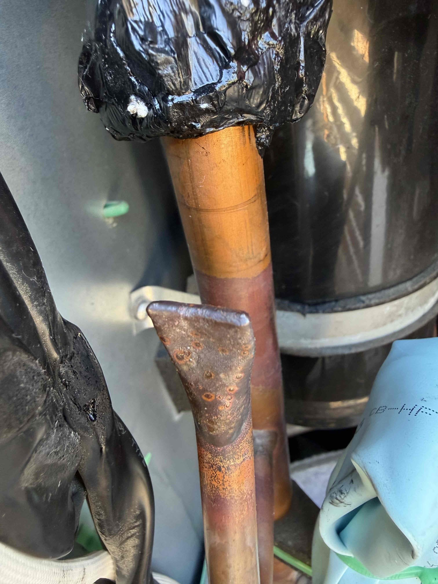 Cur off factory charge port. (Not needed) and braze shut, then add back full charge of 14 lbs. 

Performed repair, pressure tested, passed. Pulled vacuum and deed back factory charge. System is cooling properly now with 21° split. 2-year repair on where we brazed.