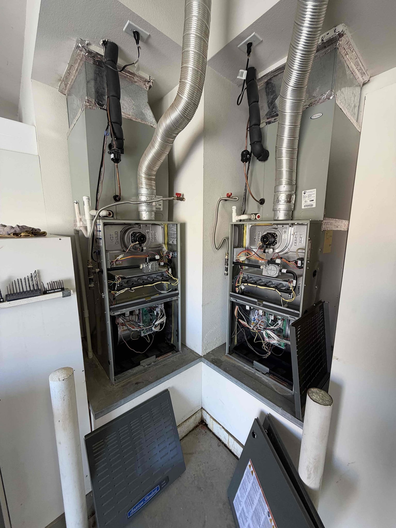 Maintenance on two American standard gold series 4 ton upflow split system. Both FAU is located in garage washable filters at each FAU. Condensation line severely clogged. Condensation lines cleared and filters washed. Two Honeywell thermostat working properly. Check both system sequence of operation. Verified all electrical and safety. Checked pressure, switch, checked inducer fan motor, checked igniter and flame sensor, check 24 V on gas valve, checked, compressor amps, checked fan motor amps, checked capacitors, checked fuses and disconnect box, upon maintenance notice one outdoor unit compressor saver kit no longer good inrush above manufacture spec. Notified client one of the FAU air handlers, condensation line severely clogged. Recommended replaced compressor saver kit and add two water safety switches. Client agreed and signed estimate. Install two water, safety switches, and compressor saver kit. Both systems are working at time of maintenance. 