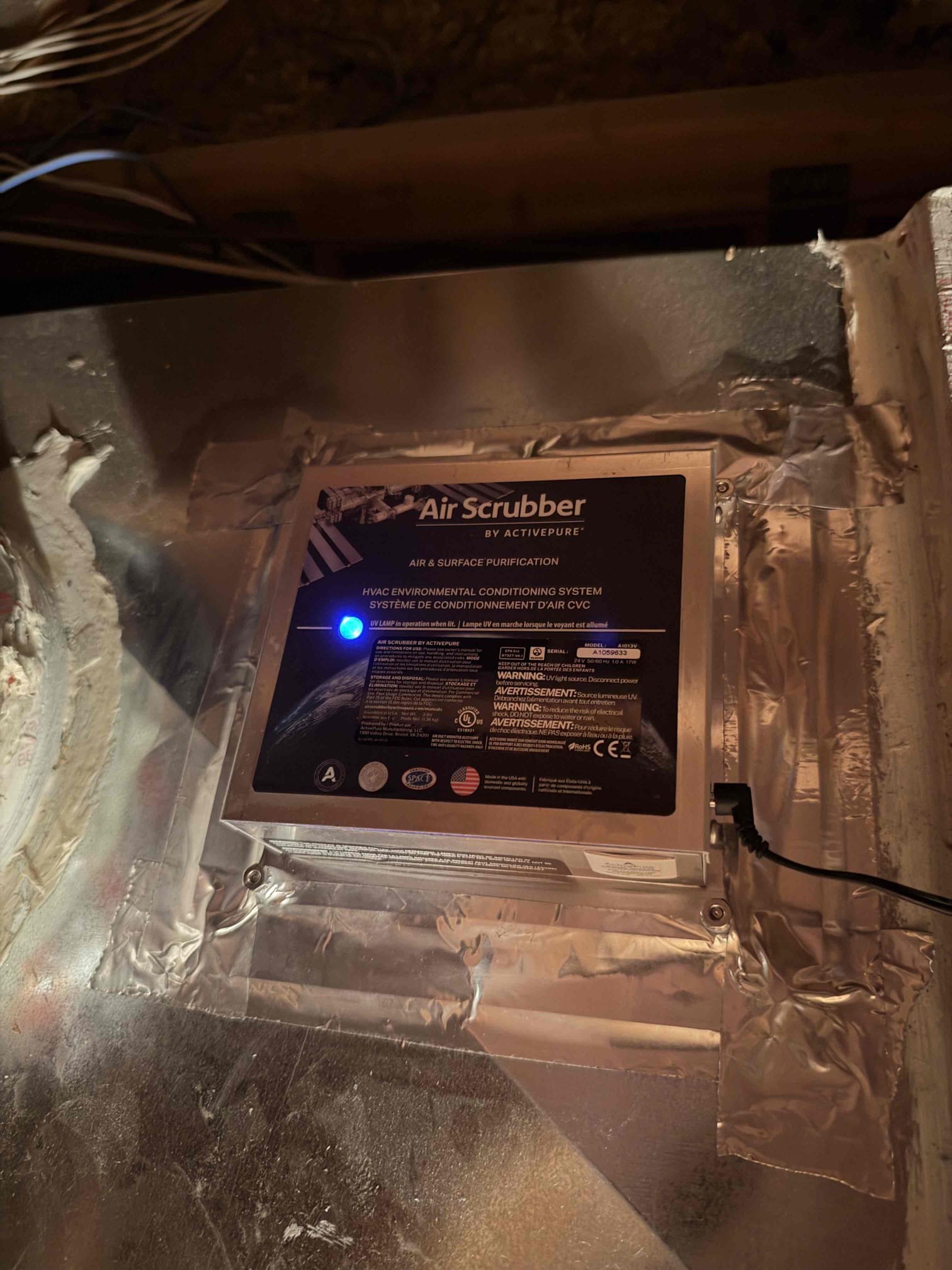 Installed two air purifier and made sure system is operational. Verified light on each purifier.