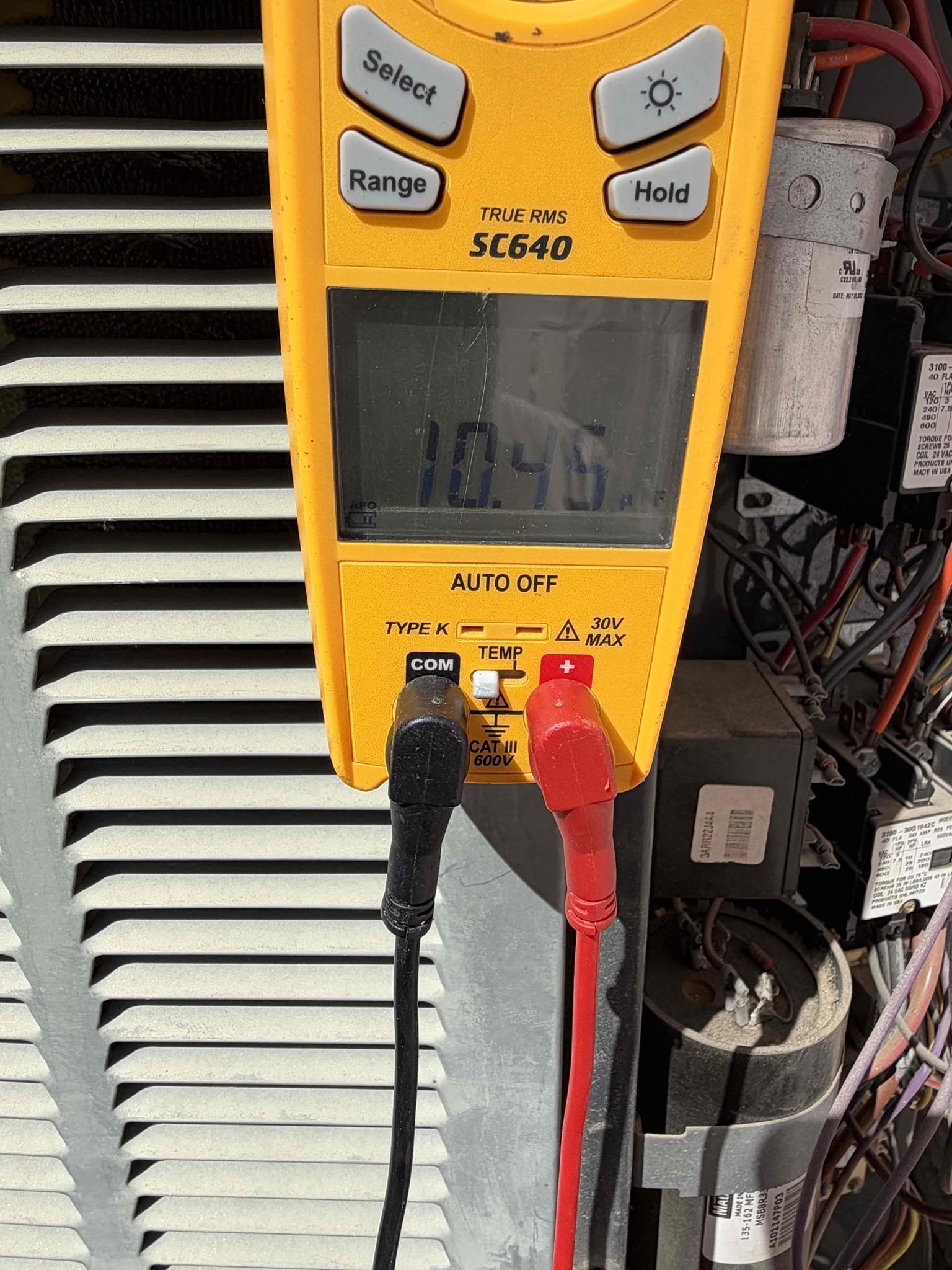 Maintenance on a TRANE 2003 R 22 upflow split system. FAU located in garage 20 x 25 filter located at FAU. Condensation line cleared filter changed. Honeywell thermostat not responsive. Client acknowledges and  remotely controls it with an app. Verified all electrical and safety. Check system sequence of operation. Check amperage draw, checked inducer motor, checked pressure switch, checked igniter and flame sensor, checked temperature split, checked compressor amps, checked fan motor amps, checked capacitor, checked disconnect box. Upon maintenance when called for cooling unit compressor struggle to kick on, capacitor rated 35 tested 10 capacitor is bad. Capacitor was replaced a year ago. Notified client of findings. System is roughly 23 years old containing R 22 Freon, notified client about the systems overall efficiency and the current condition of the systems overall performance. Highly recommended client call office and request an estimate from Barry. Recommended client replace we