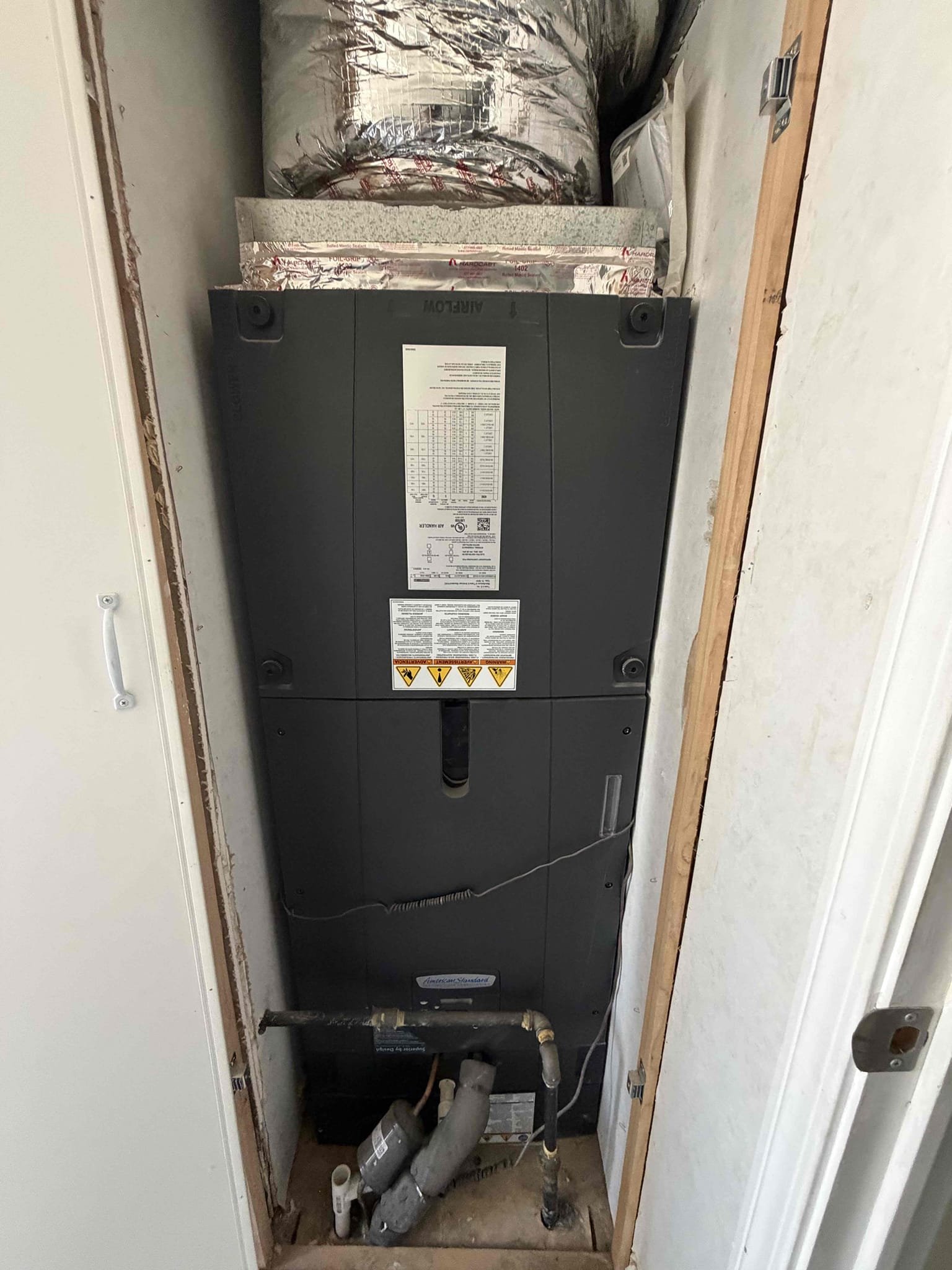Performed an outdoor safety maintenance on a 2022 American Standard split condenser, condenser located on backside of home, filter located in  house ceiling no ladder needed, fau located in hallway closet, changed 20x20, flushed condensation line, check for thermostat, on condenser check for amperage and voltage, check for compressor, check for freon level, check for capacitors, check for disconnect box everything within range also clear out dust accumulated inside electrical component area and rinsed condenser coil. System is working within specification in cooling/heating at the time of maintenance.