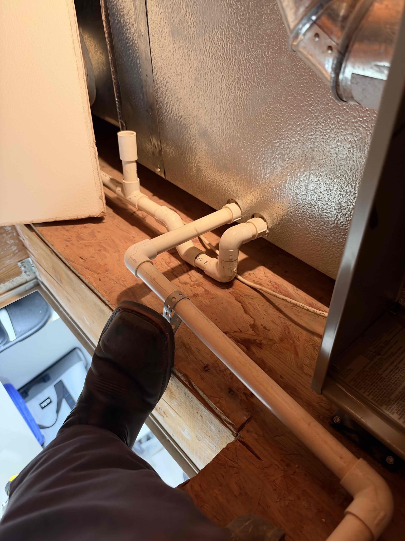 Maintenance on a TRANE 5 ton 2009 horizontal split system. 20 x 36 filter in hallway and 12 x 12 in master bedroom. Attic access in master bedroom closet. Outdoor unit located above garage on roof. Condensation lines cleared filters changed. Thermostat working properly. Clients are not home and door temperature is 90°. Checked both heating and cooling. Checked system sequence of operation. Verified all electrical and safety. Checked inducer fan motor, checked pressure switch, check igniter and flame sensor, check 24 V on gas valve, checked compressor amps, checked fan motor ramps, check, capacitor, checked fuses and disconnect box, check temperature split. Upon maintenance notice capacitor testing weak called client and recommend replace capacitor and add compressor saver kit. Client told me about previous estimate that was signed off but never received notification about repairs. It was for insulation wrap and UV wrap. Client agreed and signed estimate on repairs. Installed dual run c