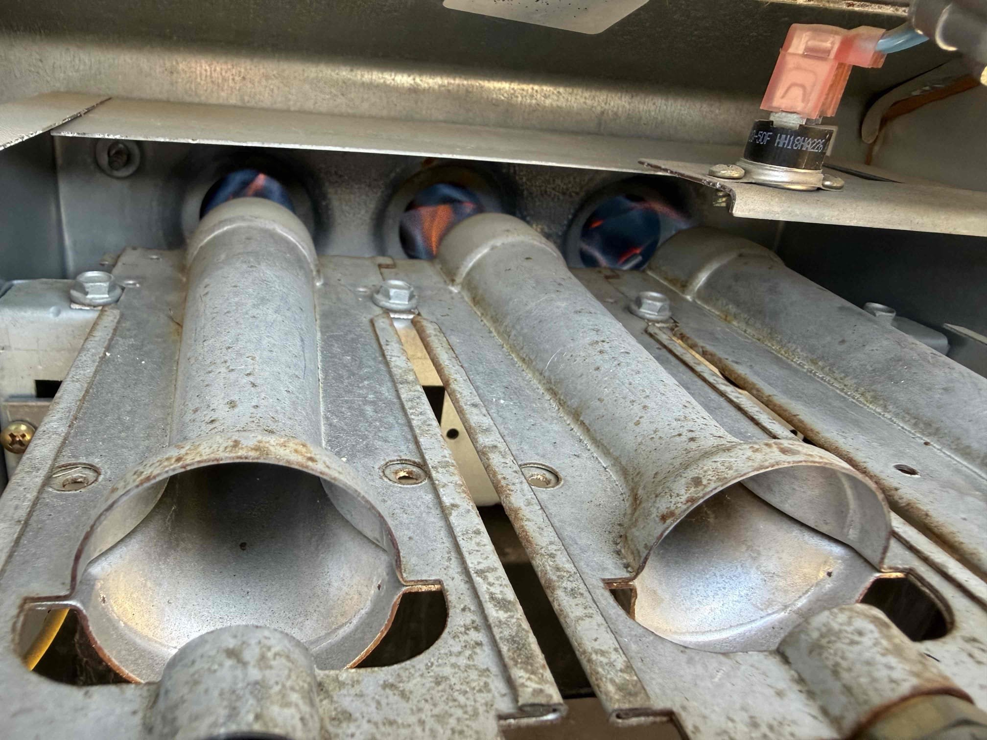 Performed heating maintenance on package unit on roof. Replaced 24x24 hallway ceiling filter. Honeywell 5000 thermostat is working properly. Cleared condensation drain on roof, terminates into rooftop drain, removed leaves. Inspected evaporator coil. Checked blower motor capacitor and checked motor amps. Cycled in heating. Heating sequence of operations was performed properly. Checked inducer motor amps. Gas pressures good, flame sensor checked out. 40° heat rise. Zero carbon monoxide detected. System is heating safely and properly at time of maintenance. Gave Starbucks gift card.