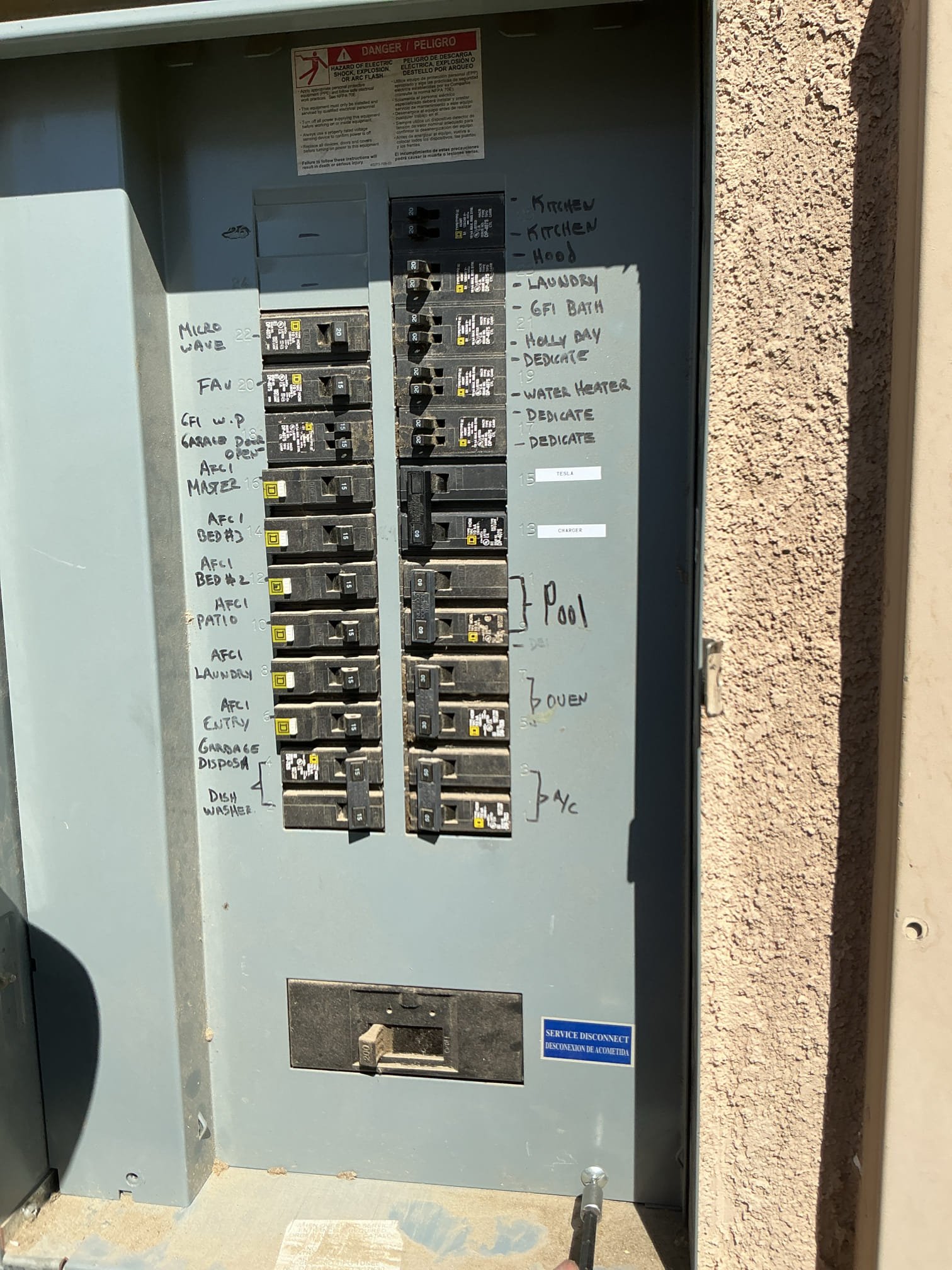 arrived to install a Tesla Car Charger in garage near panel. Installed charger on stud next to panel, had to cut drywall in order to pop out knock out I’m panel and run wires for charger. Installed a breaker. 