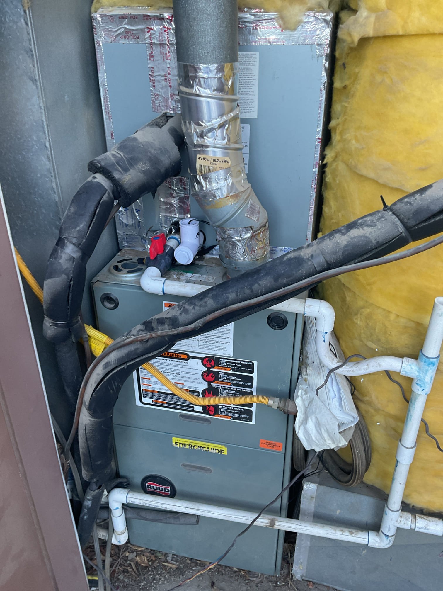 La Quinta, CA - Demand call: condensate leak

Client stated water was leaking at the bottom of the gas furnace. Leakage due to clogged P-trap. Installed two Jones valves and two float safety switches. Cleared both primary lines via Jones valve. Client paid via C. C.
