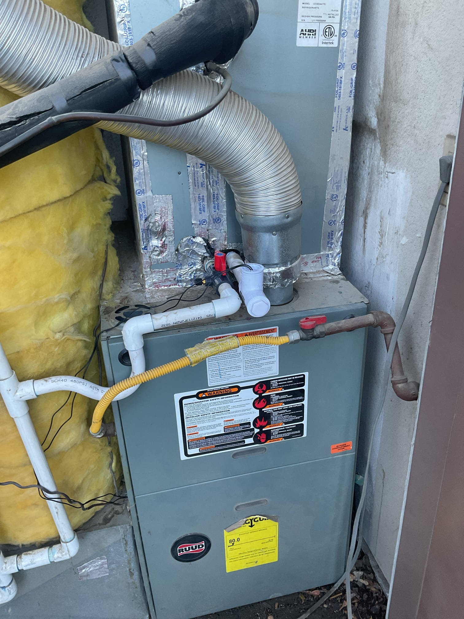 La Quinta, CA - Demand call: condensate leak

Client stated water was leaking at the bottom of the gas furnace. Leakage due to clogged P-trap. Installed two Jones valves and two float safety switches. Cleared both primary lines via Jones valve. Client paid via C. C.