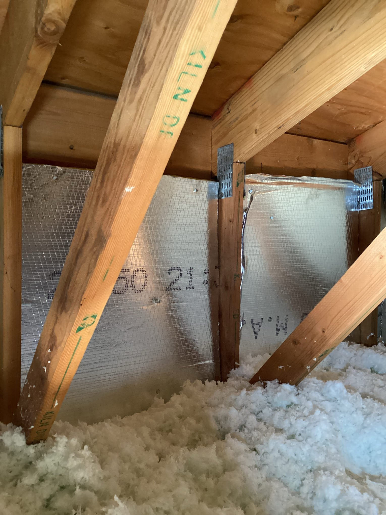 Installed duct board