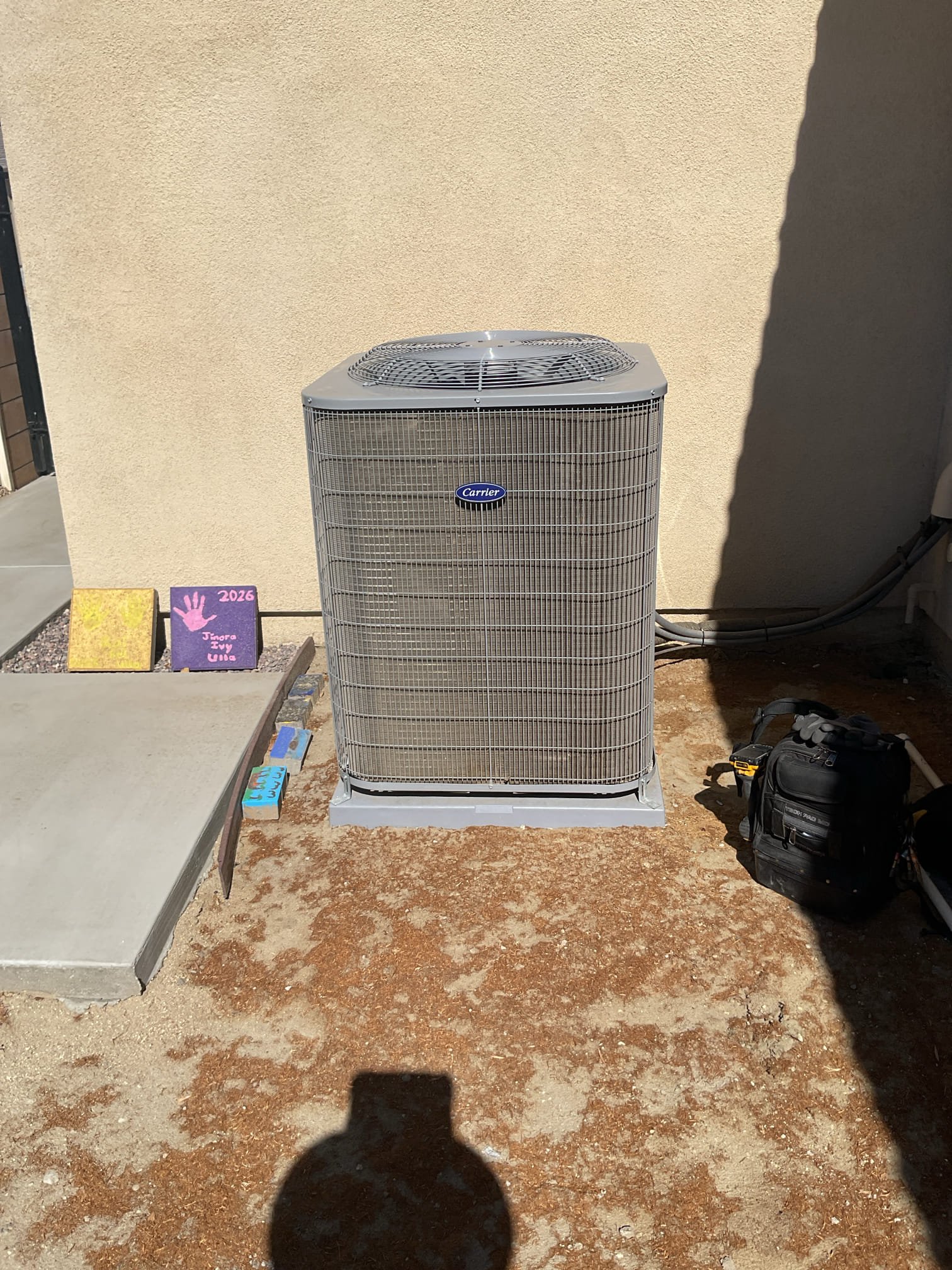 Performed annual AC maintenance and safety check on 2005 carrier split system. Changed 20 x 20 and two 20 x 30 filters. Checked amps, volts, capacitor and cleaned electrical compartment. Check refrigerant levels, super heat, sub, cool, and temperature split. Cleared condensation line and washed condenser coil located on right side of home in backyard. Cycled system from Honeywell T6 thermostat located on living room wall. Thermostat is operational. Found all electric electrical components and refrigerant level levels to be within manufactured specifications. System is operating and cooling properly at time of service. 