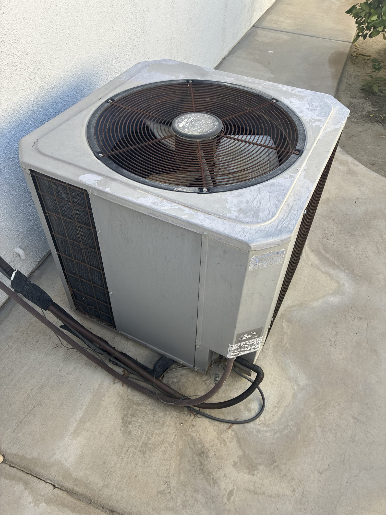 Upon arrival client stated living area system not cooling. Found blower motor not running. Found overheated blower motor and failed capacitor. Replaced capacitor and tested. Found filter so dirty it sucked into return. Advised client system is 26 years old with life expectancy of 10-15 years. Advised dust has been sucked into wheel and coil due to plugged filter. Highly recommend replacement options. Went over maintenance program and left brochure. Client to speak with mom and call to sign up.