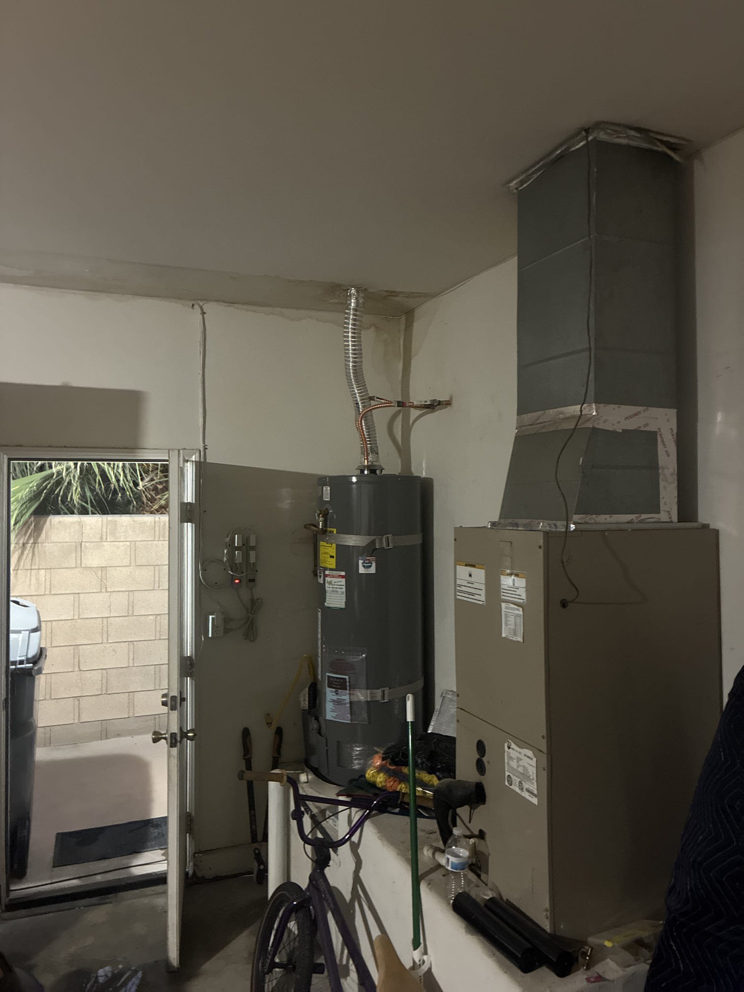 Upon arrival client stated water leaking in garage ceiling. Main house doesn’t sit above garage. Fau located upflow in garage and main house attic. Secondary lines or primary not where leak is. Advised client will need to cut drywall in garage to see where the leak is. See pictures and videos.