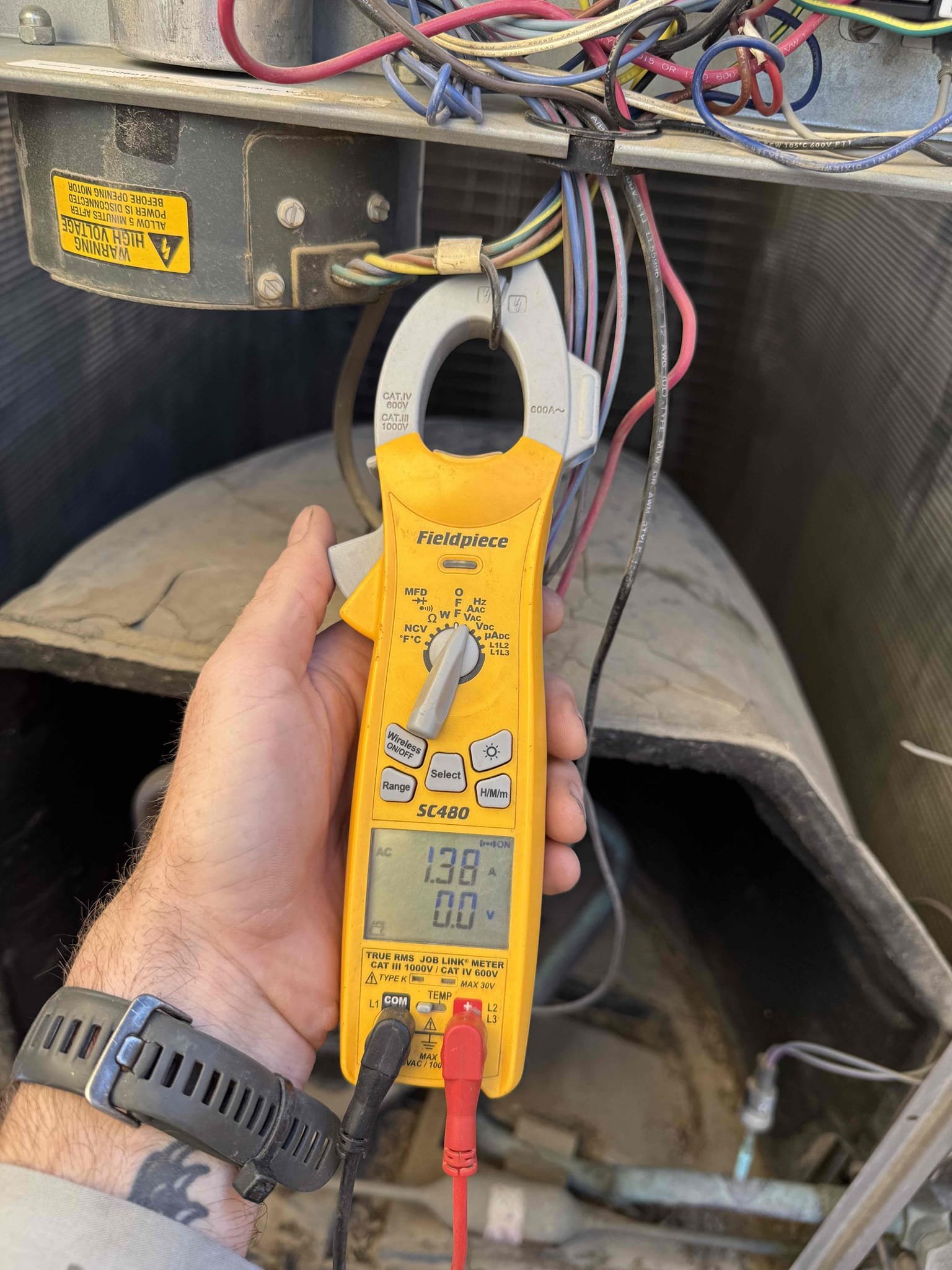 Found 80uF compressor capacitor reading 0uF. Replaced and tested York split system. System is cooling properly, all motors running and a 23° split.
Performed ac maintenance after per homeowner request. Replaced 20x25 filter at garage upflow furnace. Cleared condensation drain, terminates by condenser. Checked refrigerant charge and temperature split. Checked compressor amps, and ECM condenser fan motor amps. Cleaned out dust from condenser (outside unit) electrical compartment. Rinsed down the condenser coil. Found the compressor starting amps were above its max rated start amp. Recommended a hard start kit to assist the compressor on startup. This reduces the wear and tear and strain on the motor during every startup. This will prolong the life of the compressor which is the most importantly component and most expensive to replace. 