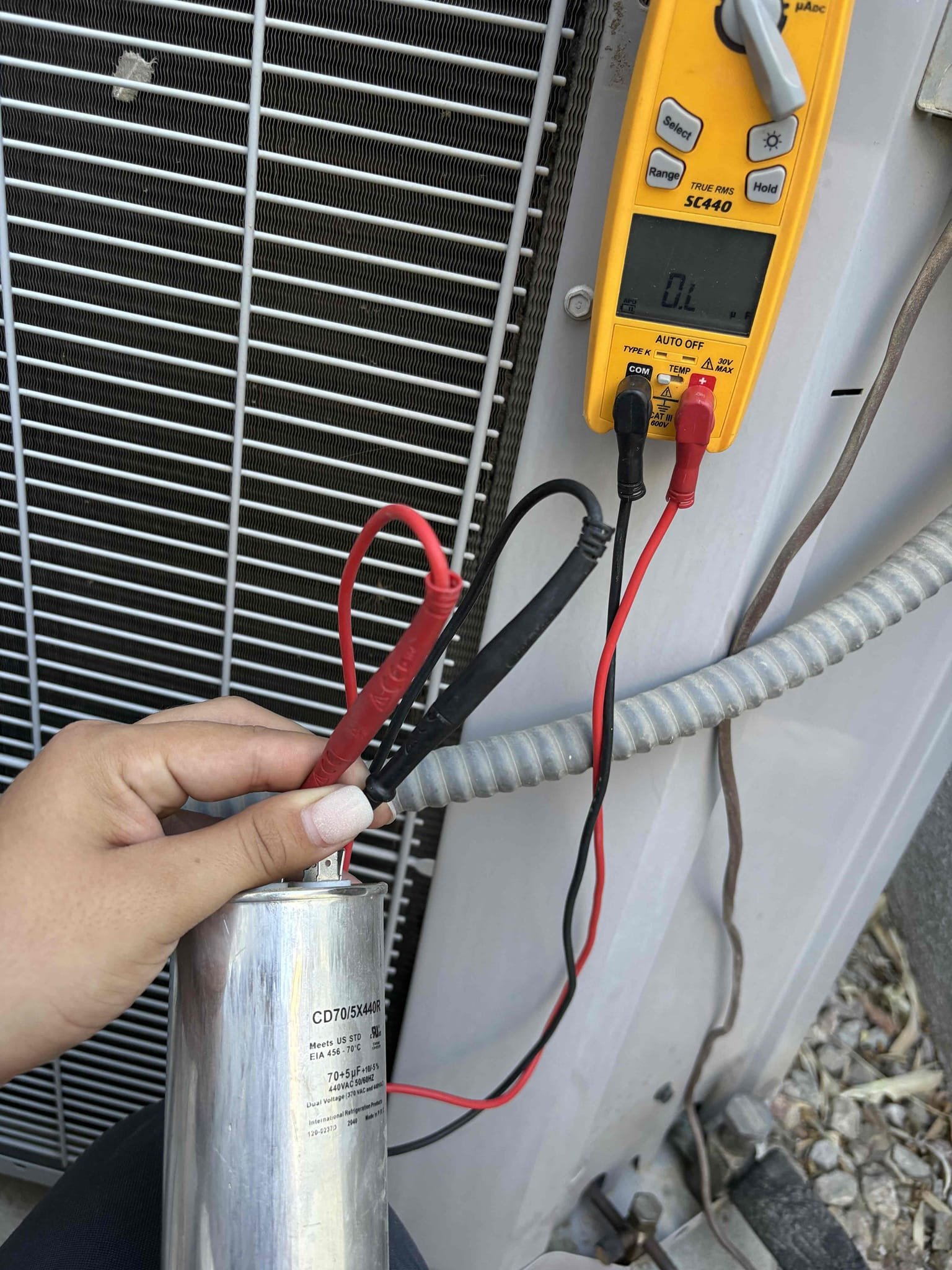 Today’s service consisted of one unit located on the side of the home upon arrival. Client stated that the air keeps blowing warm. Condenser fan was blowing, but the compressor was not starting. I tested the capacitor and it was completely out of range after replacing the capacitor and ensuring that the thermostat is properly calling for cooling with no scheduling occurring system was dropping temperature. Pressure is also checked out in the correct range check photos for reference. System is now operating to the manufacture specs at this time. 
I also booked clients for their heating maintenance before they leave town. 