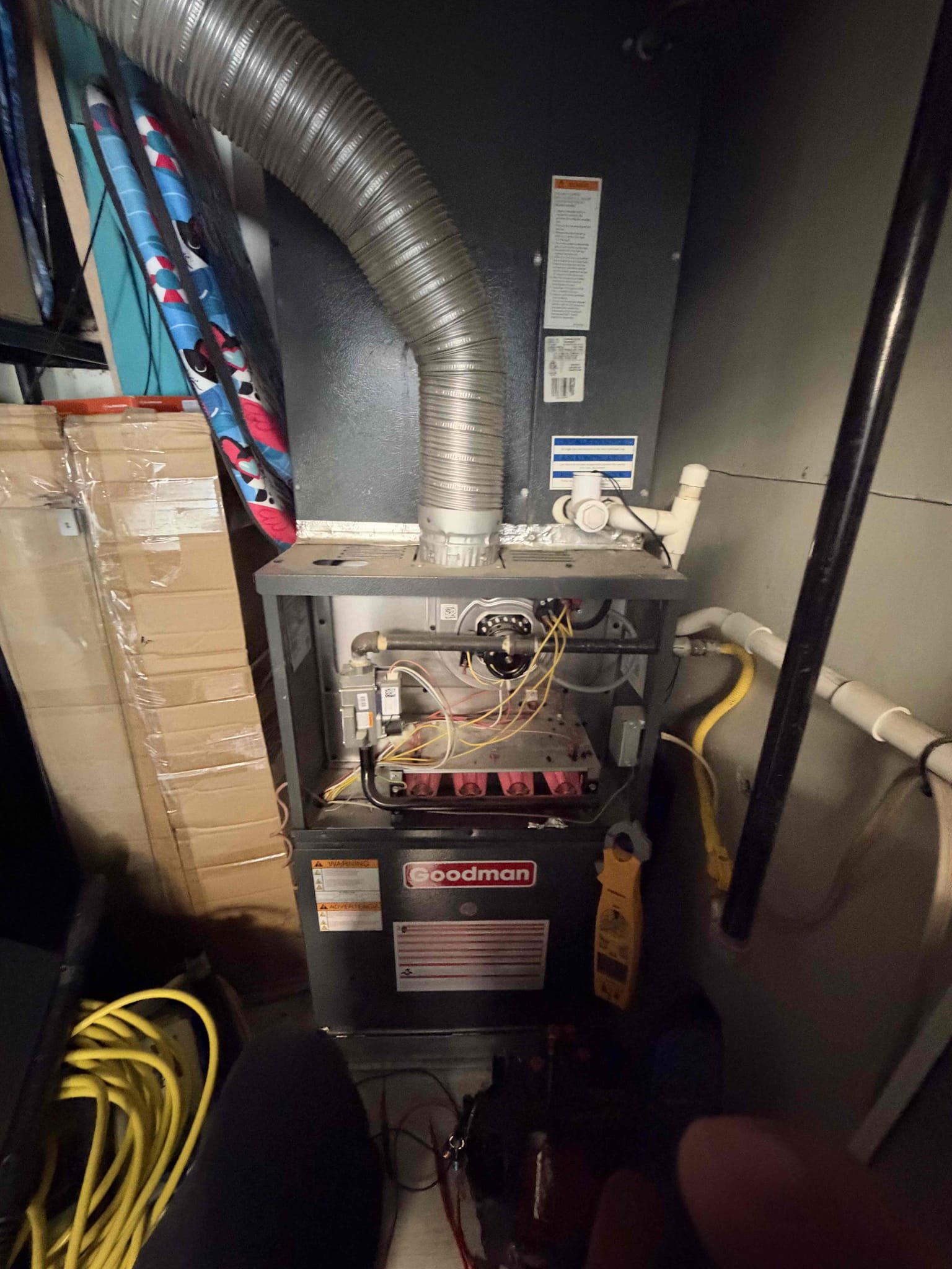 Maintenance on a Goodman upflow 5 ton split system. FAU located in the closet inside the garage. Washable filter at FAU.Condensation line cleared filter washed. Thermostat checks out OK. Verified all electrical and safety. Check system sequence of operation. Checked inducer fan motor amps, checked pressure switch, checked igniter and flame sensor, check 24 V on gas valve, verified system is heating. Cleaned out electrical compartment and burners. System is working per manufacture spec. Home is heating properly.