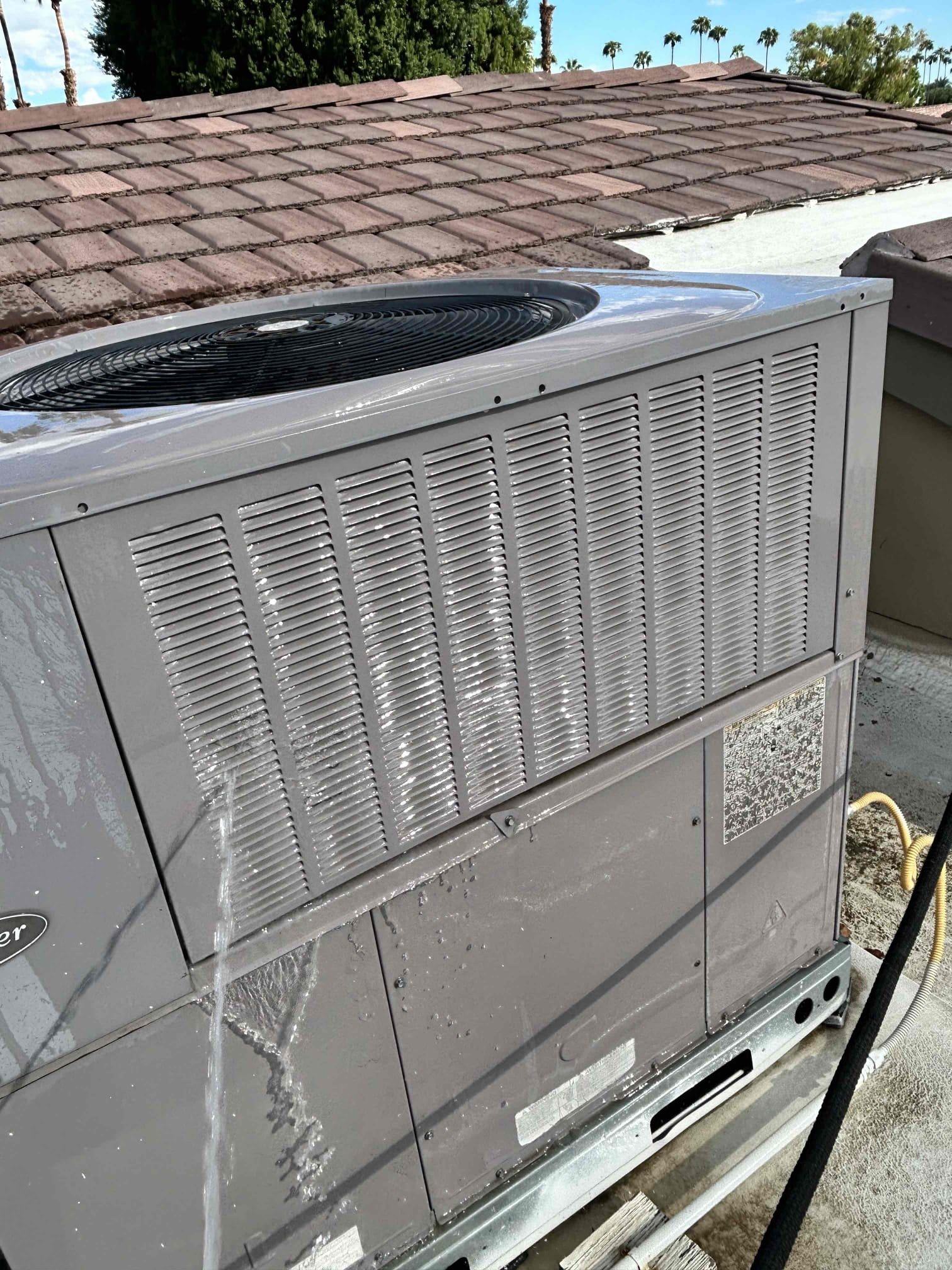 Performed annual preventive maintenance on both package rooftop units. Replaced existing air filters with new 24” × 24” filters and inspected and cleaned the coils.

Checked both thermostats and verified operation and temperature settings for evening operation. Inspected the gas belts, safety switches, and blower motors. Checked both capacitors and verified readings were within the acceptable range.

Washed out the units and cycled the cooling systems to verify compressor amperage and contactor operation.

Both systems responded properly to thermostat calls and are operating properly at the time of service. Annual maintenance completed on both units.