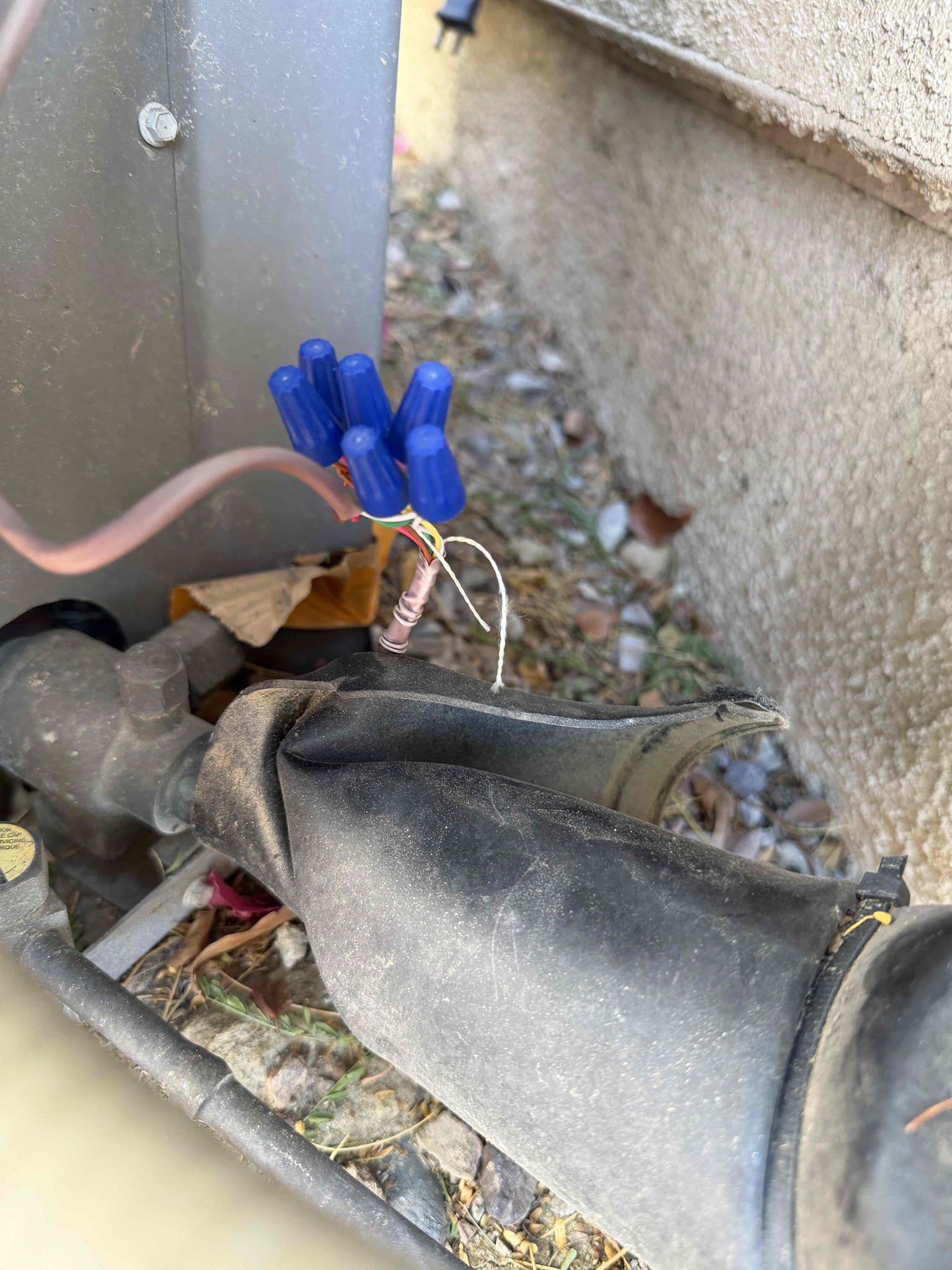 Performed an outdoor safety maintenance on a AC Pro condenser and a Lennox condenser, found condenser S#8377 not operating found low voltage spliced fixed the tstat wire unit I now working properly , condenser located on right side of home, filter located on ceiling, fau located in attic, changed 20x30 14x14 & 14x24  filter, flushed condensation line, check for thermostat, on condenser check for amperage and voltage, check for compressor, check for freon level, check for capacitors, everything within range also clear out dust accumulated inside electrical component area also check for disconnect box and rinsed condenser coil. System is working within specification in cooling at the time of maintenance.