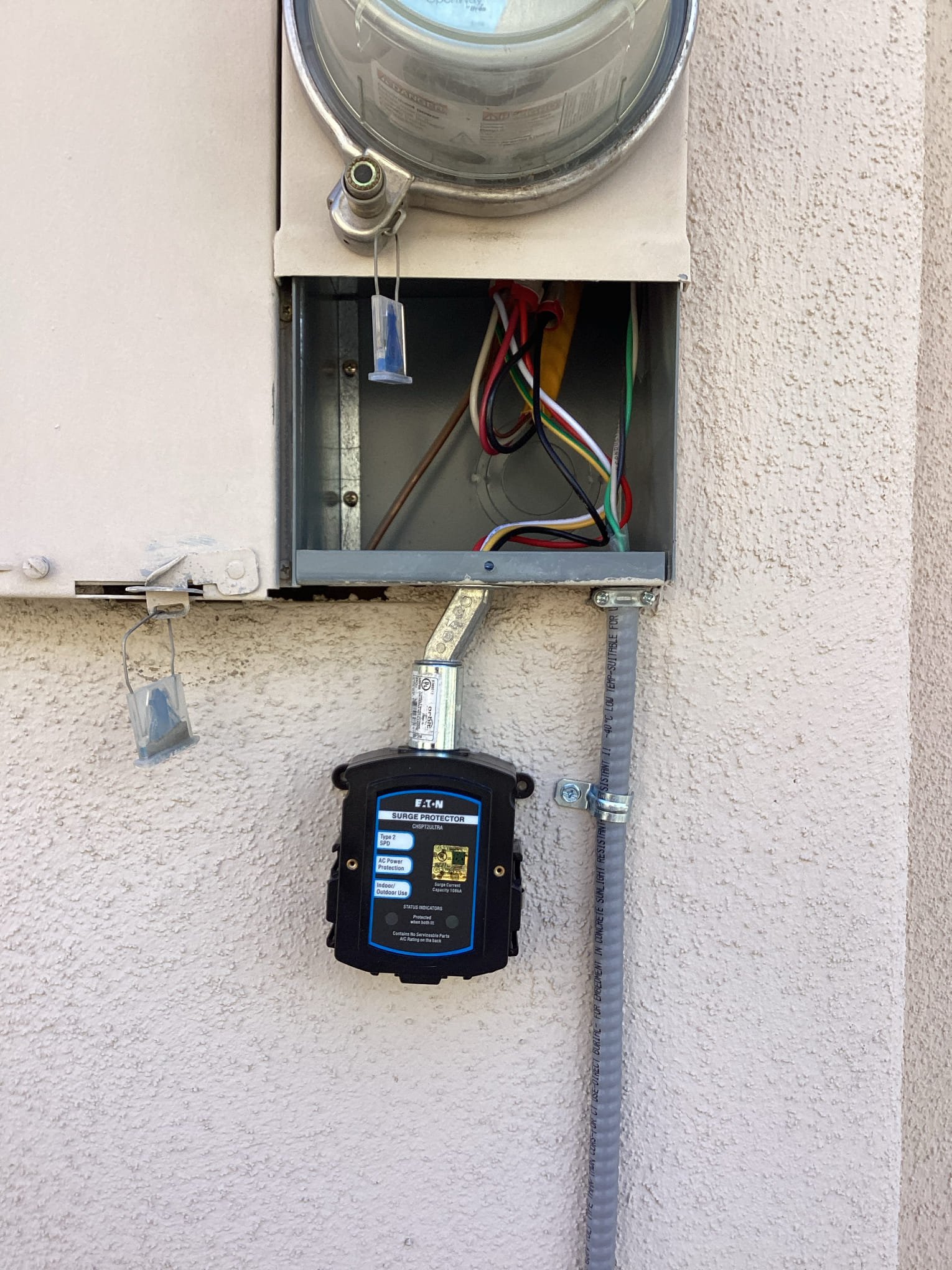 Arrived at customers home to install a new ultra surge protector on the main breaker panel for home. Penetrated out of the bottom of the main panel and set an ultra surge protector directly onto bottom of panel. Landed all connections and set breaker to ensure proper operation of surge protector. Confirmed with customer to complete scope of work for today.