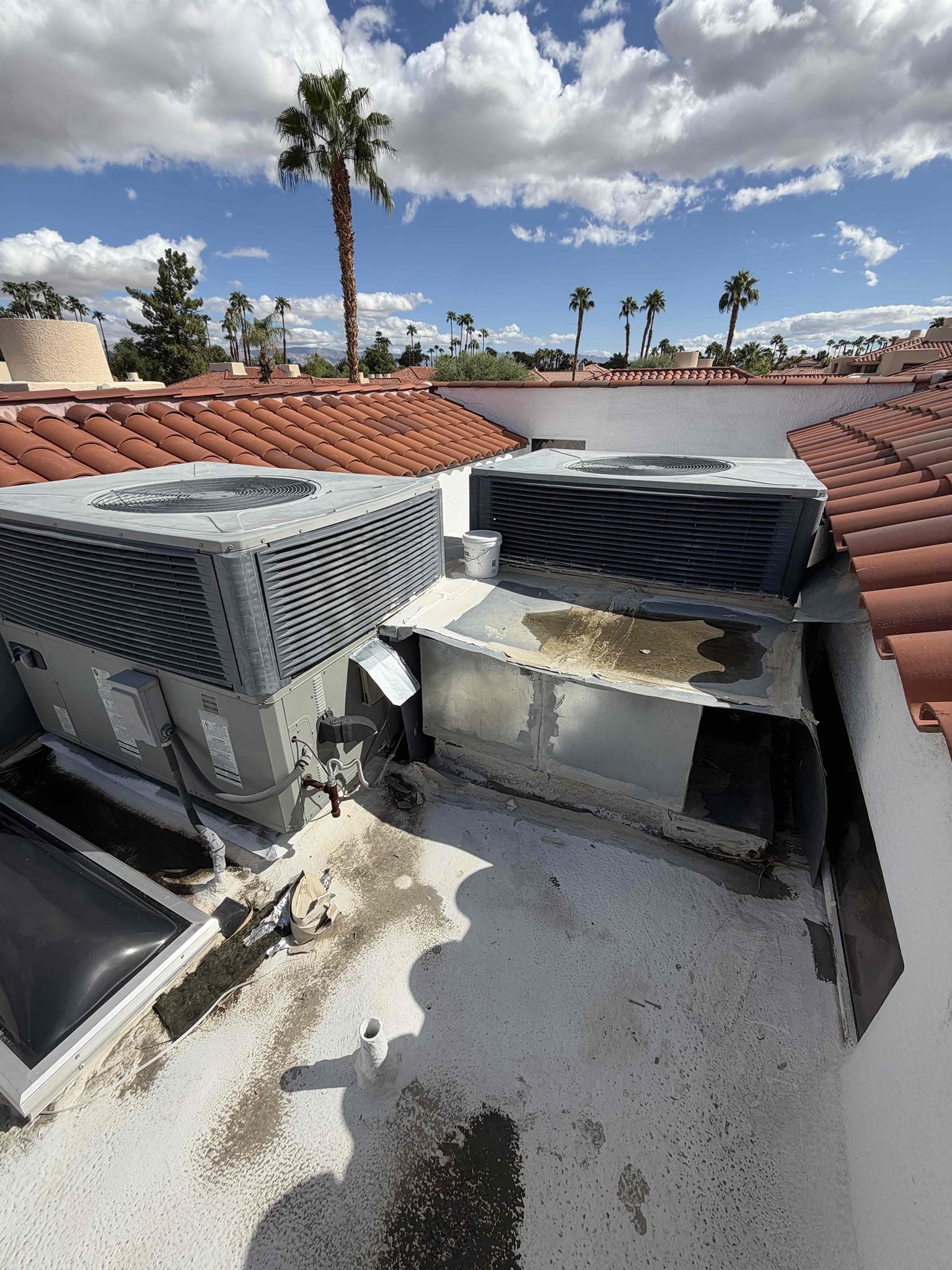 Demand call upon arrival. Client stated they had repairs done on both package units Plenum’s. Stated that several days ago it was raining hard causing water leaks in master bedroom bathroom. Climbed onto roof to check both package units return plenums and supply. Verified plenums are securely sealed. Client stated this is an ongoing issue before we started servicing the equipment. Could not determine where water is leaking. Properly secured and sealed both Plenum’s again. Recommended client call a roofer. 