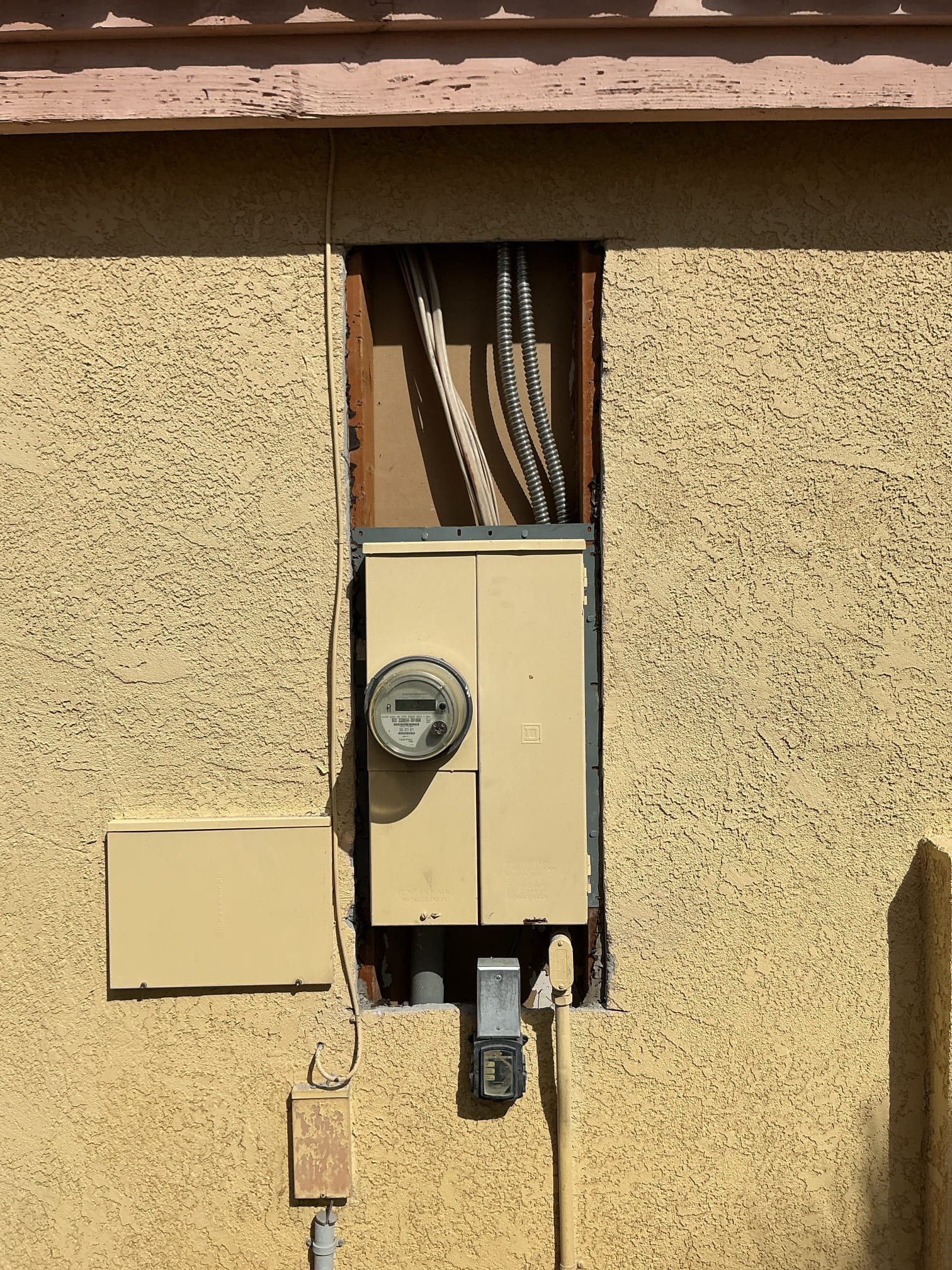 Arrived to perform a panel change out. Labeled all breakers and wires before disassembling original panel. Removed original panel. Measured new panel and set panel to code standards. Connected all ground and neutral wires. Installed Surge Protector and Electric Vehicle Charger. Ran wires into new panel. Connected all wires to breakers accordingly. Passed rough inspection. 
