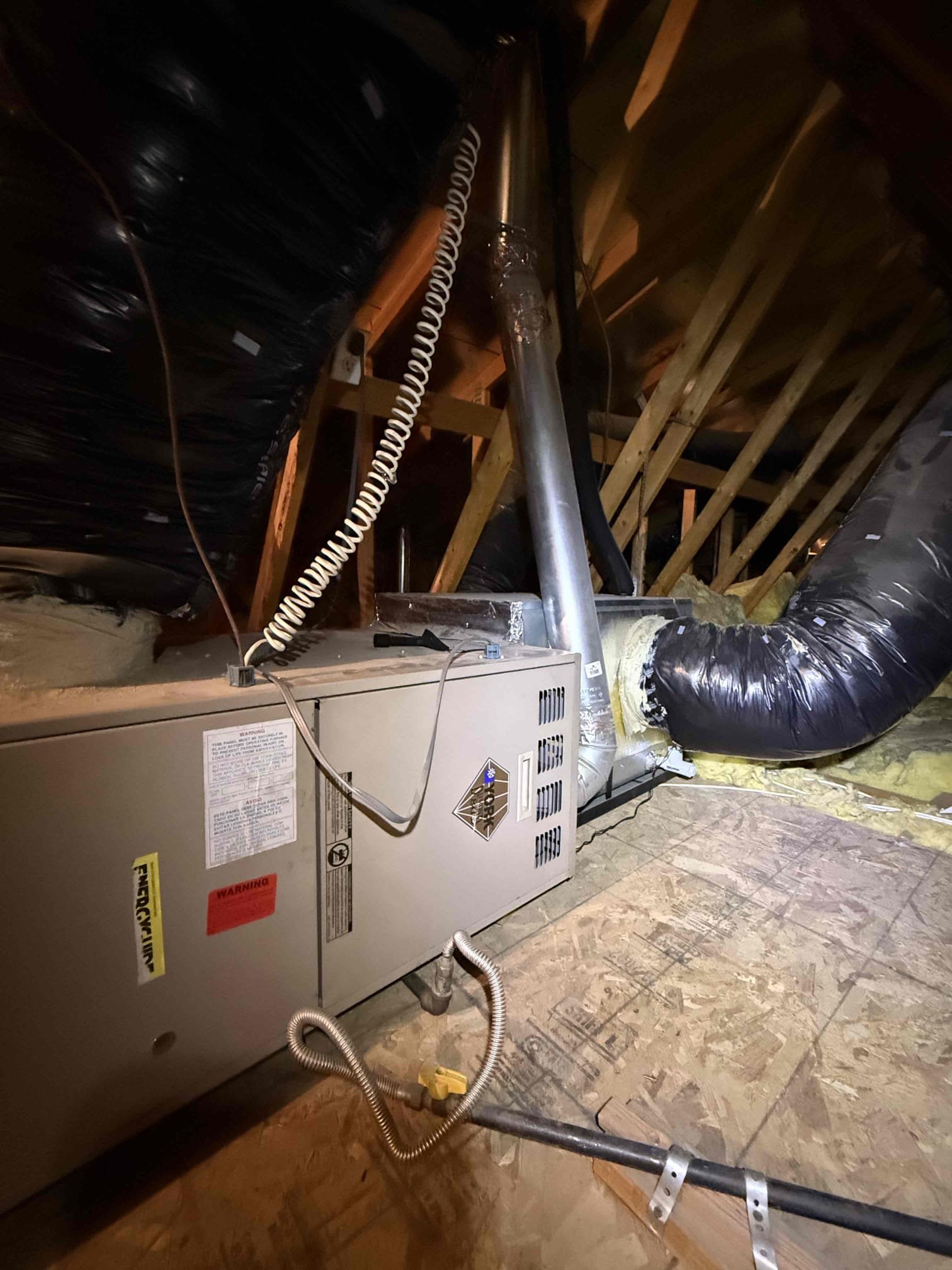 Homeowner noticed water dripping from ceiling return right before main bedroom door when it rained recently. He then noticed from looking at roof outside that the flue pipe was showing about 2 feet of unpainted sheet metal section. Top half with slanted cover painted a brownish red and had concern if we had moved it during maintenance or demand. Flu was no longer used as system was previously a gas furnace and a company replaced with a heat pump. I was able to pull it down til no more exposed sheet metal section was visible from street. I showed homeowner pictures from when I was in attic and vent was always like it was today upon arrival. Recommended maybe reaching out to a contractor about how it should be to prevent any rain coming in.