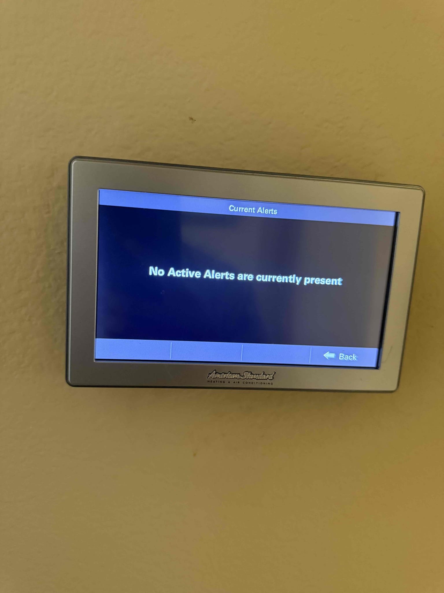 Upon arrival unit was idle with temperature satisfied. Tested and cycled. Compressor and fan motor amps are in range. Measured proper communicating 12.5 VDC. Multiple error codes for air cleaner but none are installed. Need to return to replace 1050 thermostat. Notified office to schedule return to swap thermostat. 