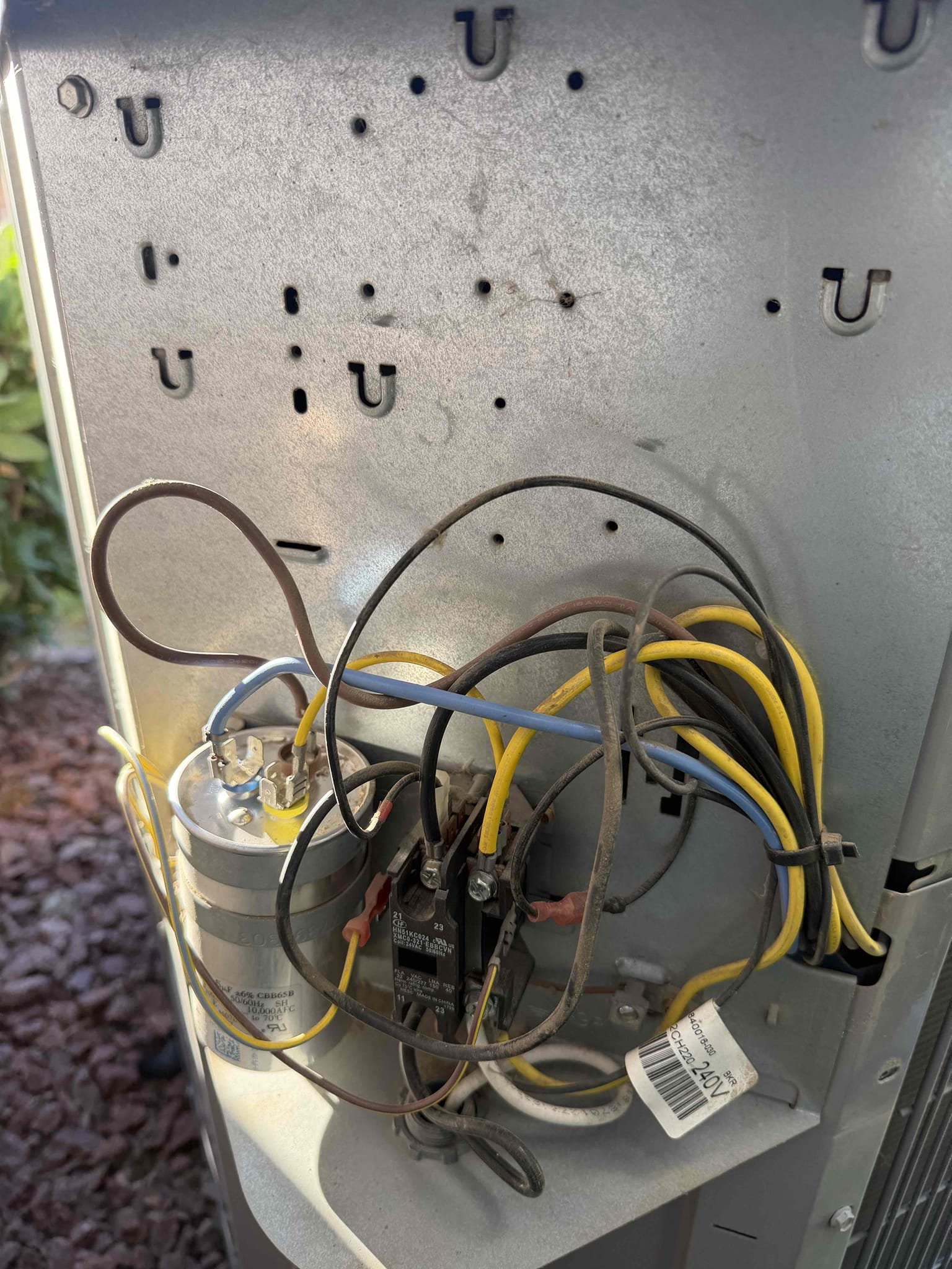 Performed a cooling maintenance on a carrier  condenser, condenser located on backside of home, filter located in ceiling, fau located in attic, attic access located in master bedroom closet, changed filter, flushed condensation line, on condenser check for amperage and voltage, check for compressor, check for freon level, check for capacitors did recommend replacing cap was out of range and recommend a start kit as well , everything within range also clear out dust accumulated inside electrical component area and rinsed condenser coil. System is working within specification in cooling at the time of maintenance.