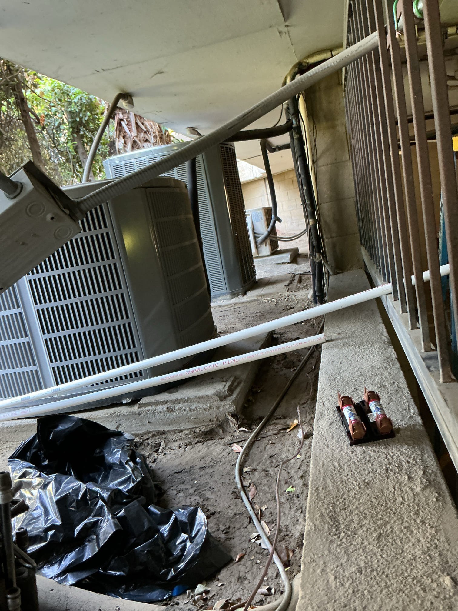 Arrived to run new thermostat wires for new unit being installed. Ran wire in fau closet through existing access down to garage floor and strapped wire onto line set. 