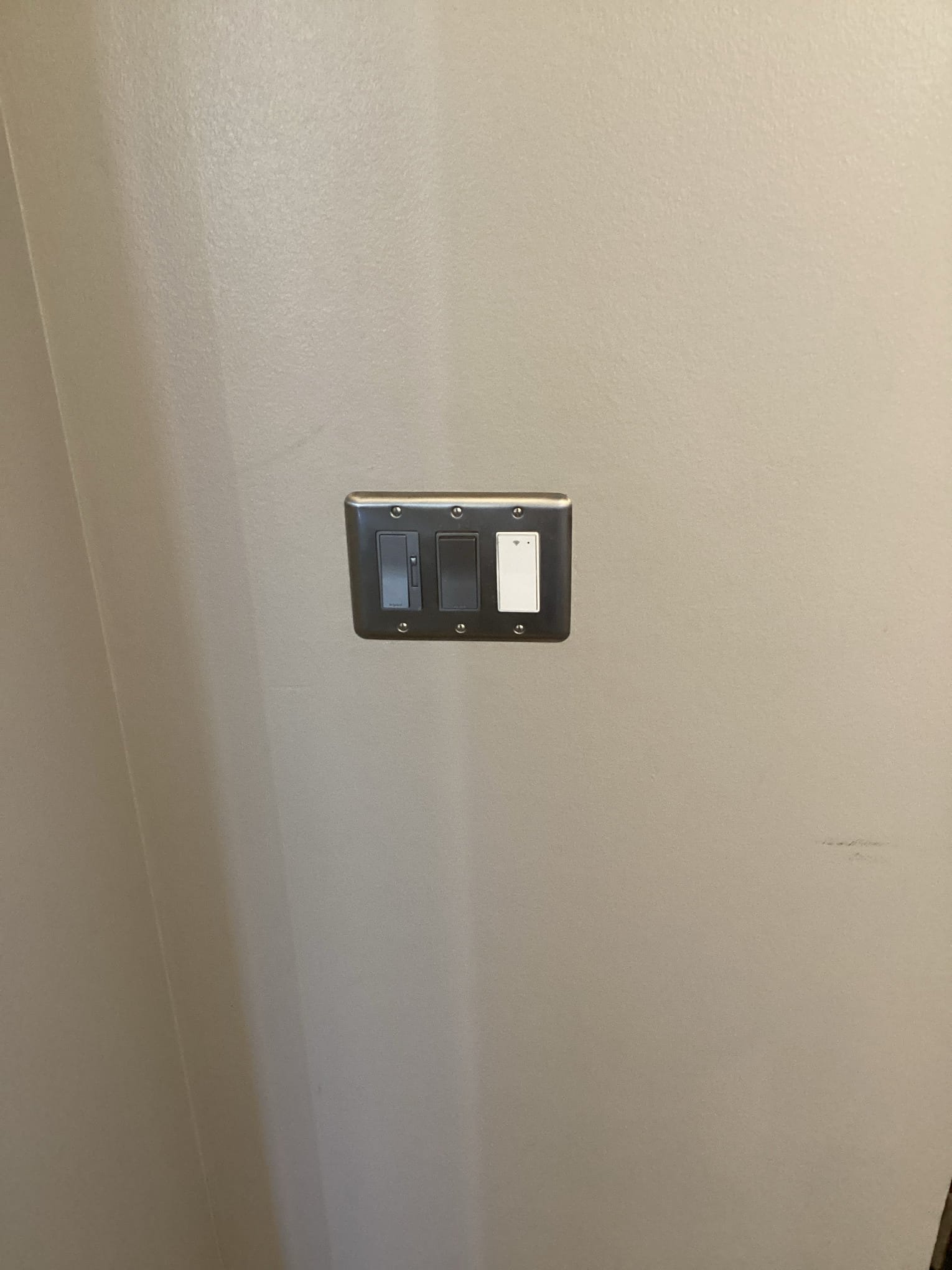 Rancho Mirage, CA - Arrived at customer’s home to replace two customer supplied switches and to fix an outlet falling out of the wall in the bathroom. Removed both existing switches from boxes and replaced them with a dimmer and a smart switch for the front lights. Tested operation of both switches, fixed outlet in bathroom, and confirmed proper operation with customer to complete scope of work for today.
