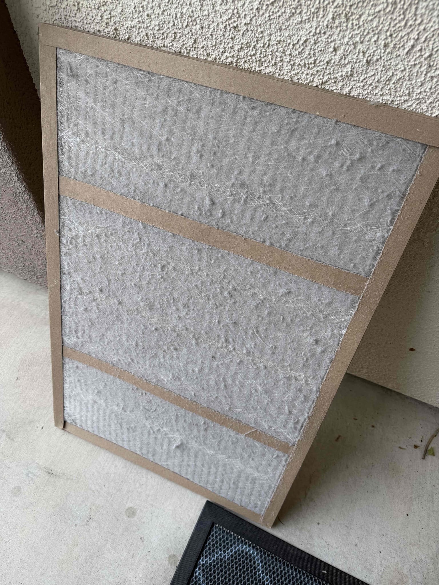 La Quinta, CA - Replaced ceiling 20x30 filter in hallway. Cleaned off dirty return register into old filter before disposing. Put new filter in nice and secure. 