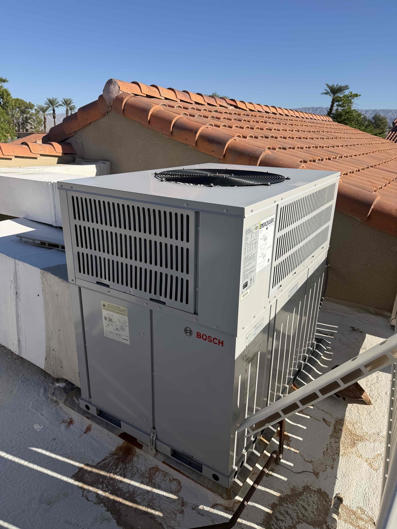 Performed a heating maintenance on a Bosch package unit, changed 20x25 filter, filter located on hallway ceiling, flushed condensation line, on unit check for amperage and voltage, followed sequence of operation, check for temperature split, everything within range also clear out dust accumulated inside electrical component area. System is working within specification in heating at the time of maintenance.

