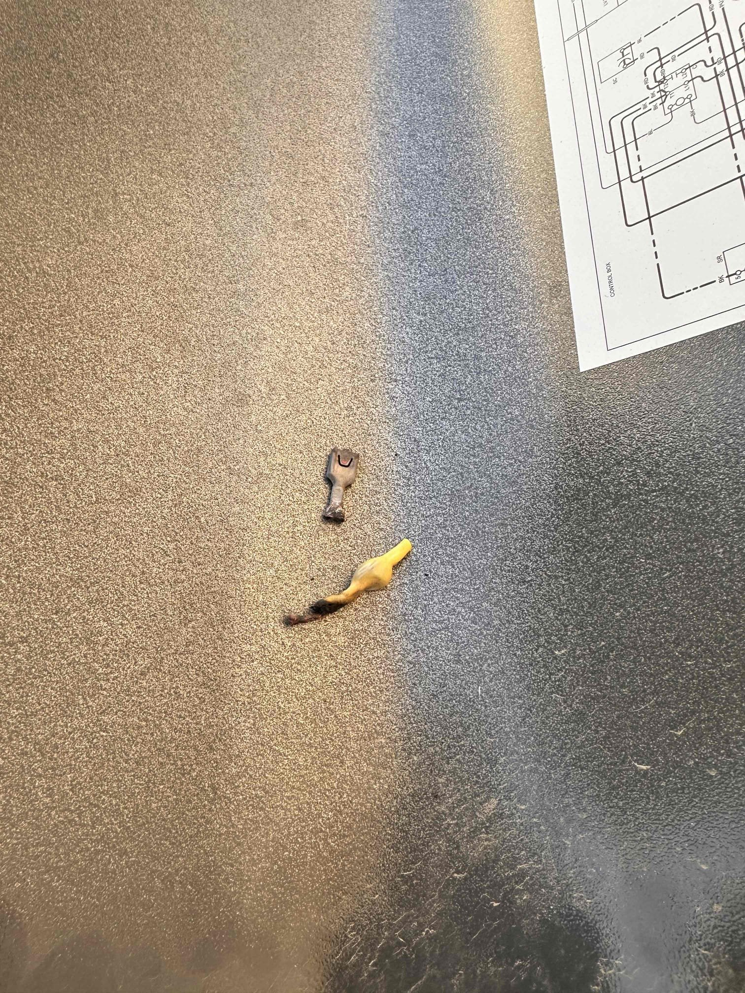 Responded to a demand call for system not cooling on outdoor equipment model GSXN403610AA, serial number 2307170729. Member stated the indoor temperature would not drop below 80°F with the thermostat set to 76°F. Upon arrival, found indoor equipment and condenser fan motor operating, but compressor was not running. Further inspection identified burnt wiring and loose connections at the run capacitor. Removed damaged wire sections, stripped wiring back to clean conductor, and secured connections at the run capacitor. Verified fittings were tight and secure. Restarted equipment and tested compressor starting amperage, compressor running amperage, and condenser fan motor amperage. Compressor operation was restored, and system is now cooling and operating properly. Thermostat temperature decreased from 80°F upon arrival to 78°F upon completion.