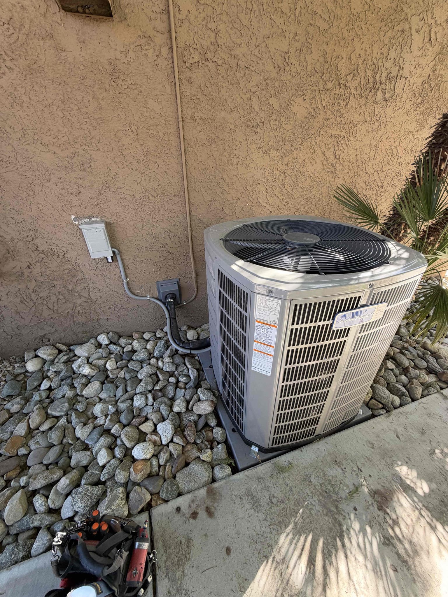 Maintenance on an American Standard platinum series 4 ton upflow heat pump. FAU located in a closet by the hallway in front of master bedroom 20 x 25 filter at FAU. Condensation line cleared filter changed. Outdoor unit located on the right side of the home. Mitigation board and relay panel communicating. 850 thermostats shows no active alerts. Verified all electrical and safety. Verified condensation line draining properly. Checked system sequence of operation. Checked compressor amps, checked fan motor amps, checked Freon and temperature split, checked fuses and disconnect box, checked FAU amps, verified system heating. Outdoor unit has surge protector. System is working per manufacture spec. Gave client electrical safety inspection. 