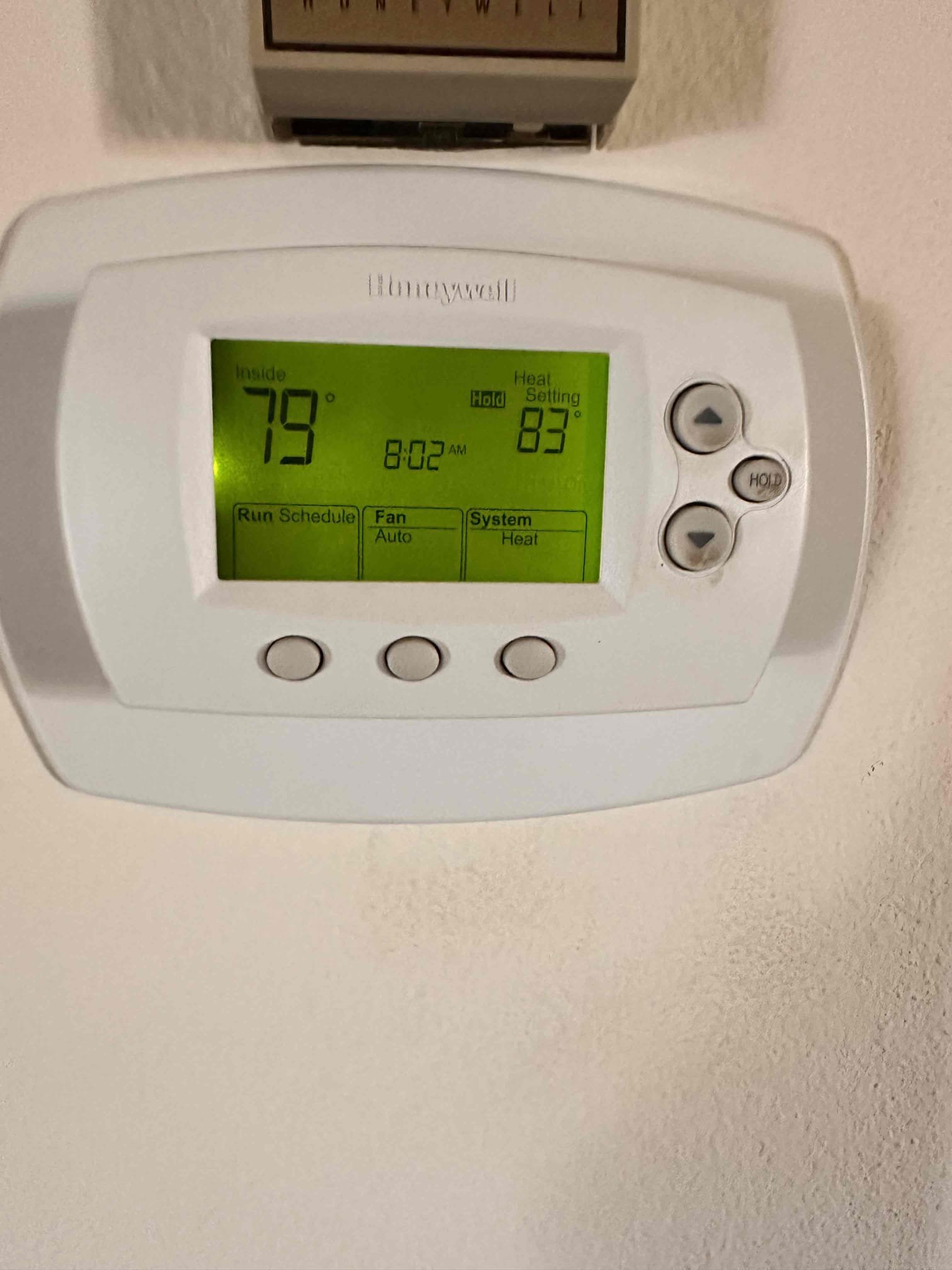 Performed scheduled indoor equipment maintenance and safety checks on two natural gas heating systems located in the attic, with hallway access next to the garage entrance. Accessible equipment identified as 2009 Lennox, model G60UHV-36A-070X-09, serial 5909A13860. The second system’s data plate and burner compartment were inaccessible due to excessively tight attic clearance, limiting inspection of that equipment.

Replaced one 20 × 30 and two 14 × 24 filters located in ceiling returns. Cleared equipment platforms of dust and debris. Verified ductwork was secured and attached to both systems and in fair condition. Cleared condensate lines; outside terminations are next to the outdoor equipment on the east end of the home. Verified both Honeywell 6000 thermostats were operational.

Verified heating temperature rise on both systems and checked temperatures at multiple registers throughout the home. Documented Lennox return temperature at 80.4°F and supply temperature at 124.0°F, providi