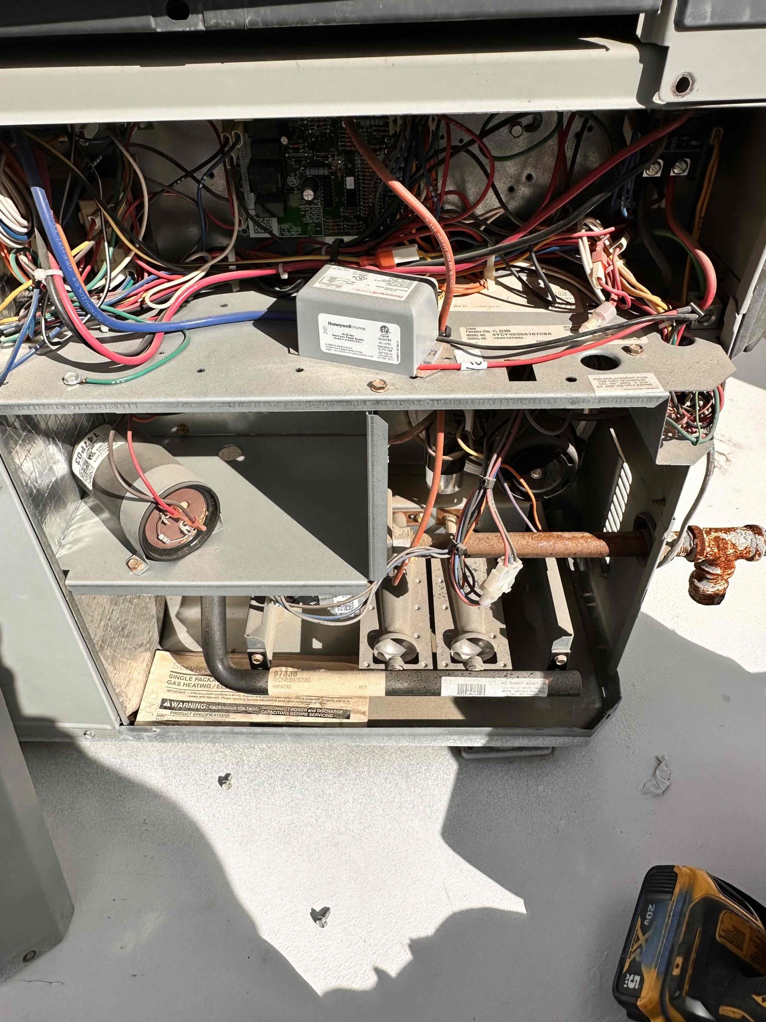 Performed scheduled heating maintenance and safety checks on two Trane natural gas/electric package units:

* 2019 Trane: Model 4YCZ6036C1070AB, serial 191113937L.
* 2013 Trane: Model 4YCY4030A1075BA, serial 134512266L.

Cleared electrical components, burner compartments, and disconnect boxes of dust and debris. Verified electrical connections were tight and secure. Checked voltage, motor amperage, and applicable capacitors. Verified proper inducer operation, heating sequence, burner operation, and safety/rollout switches. Checked static and gas pressures. Verified zero carbon monoxide detected. Metal ducting was secured and attached to both units and in fair condition. Verified thermostat operation, clear condensate drainage, and continued operation of UV lights and surge protection.

The 2019 unit measured 82.0°F return and 124.7°F supply, providing a 42.7°F temperature rise. The 2013 unit measured 86.5°F return and 123.8°F supply, providing a 37.3°F temperature rise. Both readings w
