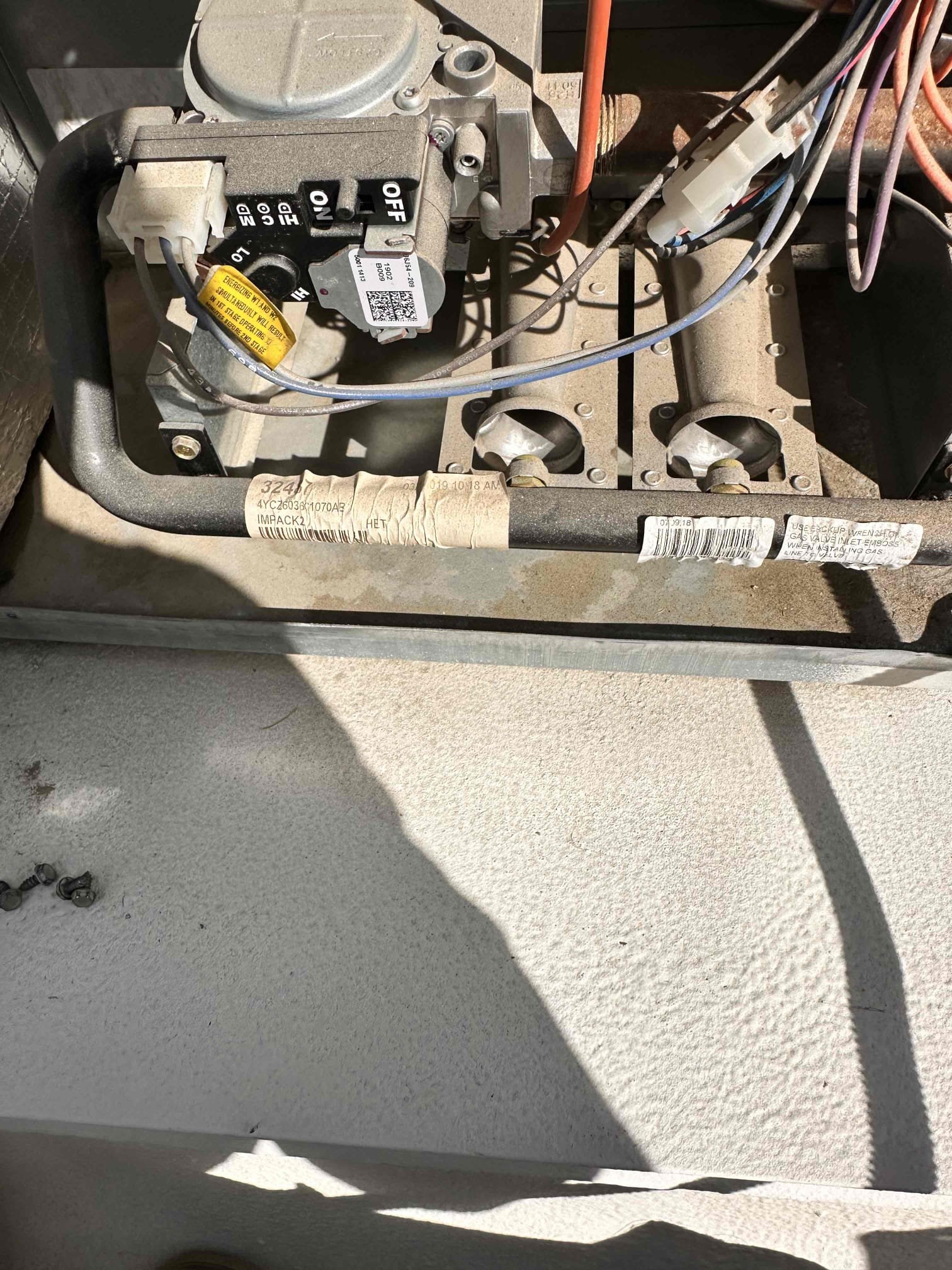 Performed scheduled heating maintenance and safety checks on two Trane natural gas/electric package units:

* 2019 Trane: Model 4YCZ6036C1070AB, serial 191113937L.
* 2013 Trane: Model 4YCY4030A1075BA, serial 134512266L.

Cleared electrical components, burner compartments, and disconnect boxes of dust and debris. Verified electrical connections were tight and secure. Checked voltage, motor amperage, and applicable capacitors. Verified proper inducer operation, heating sequence, burner operation, and safety/rollout switches. Checked static and gas pressures. Verified zero carbon monoxide detected. Metal ducting was secured and attached to both units and in fair condition. Verified thermostat operation, clear condensate drainage, and continued operation of UV lights and surge protection.

The 2019 unit measured 82.0°F return and 124.7°F supply, providing a 42.7°F temperature rise. The 2013 unit measured 86.5°F return and 123.8°F supply, providing a 37.3°F temperature rise. Both readings w