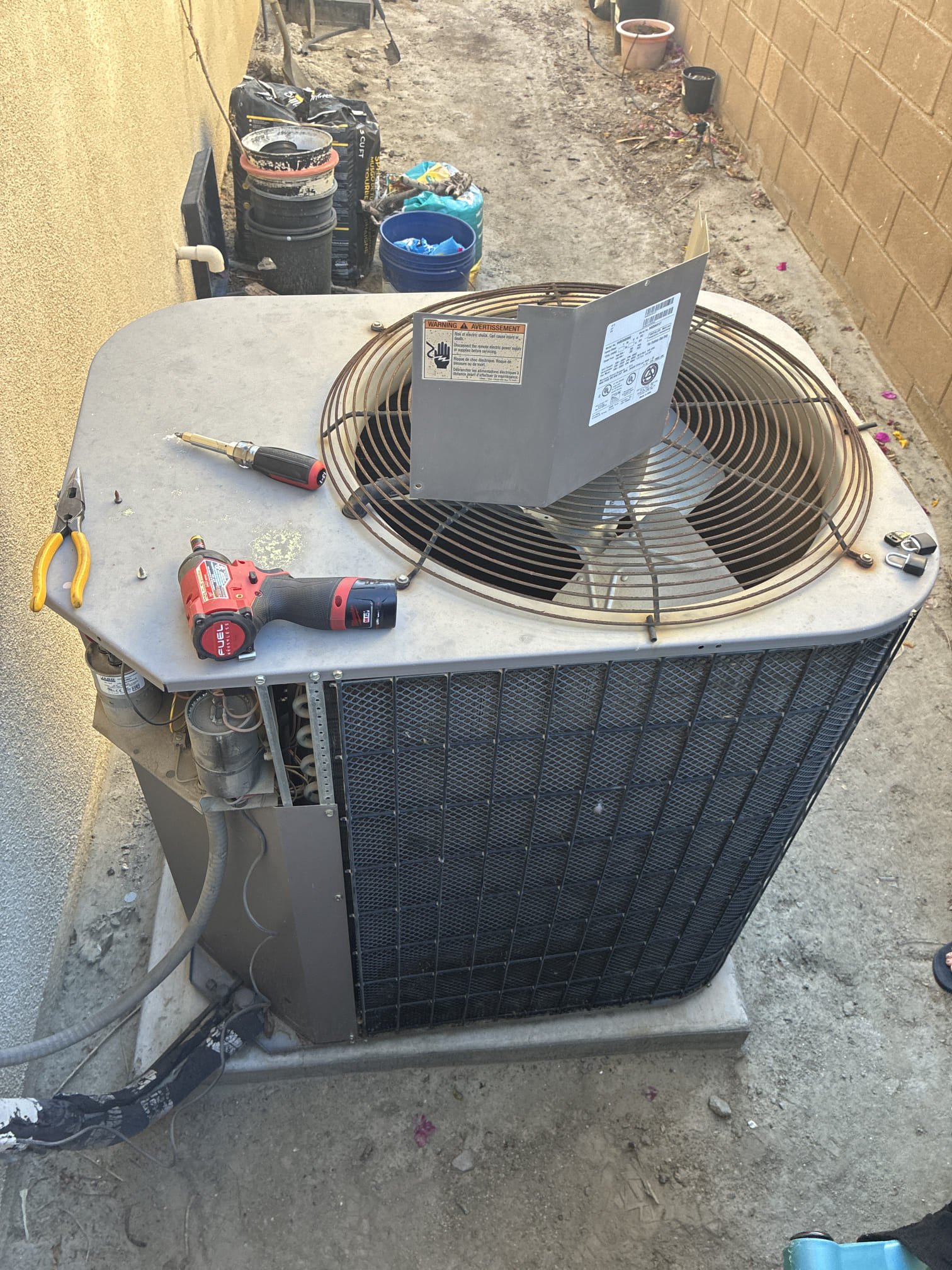 Upon arrival client stated system hasn’t been cooling for a few days. Stated smell coming from outdoor unit. Cycled system and found fan motor hardly spinning and running well over max amps. Advised client system is 21 years old I sing r22 refrigerant no longer being produced. Advised client fan motor has failed. Client would like to replace motor. Installed new oem fan motor and tested. Signed up on yearly agreement. Client would like replacement option as well.