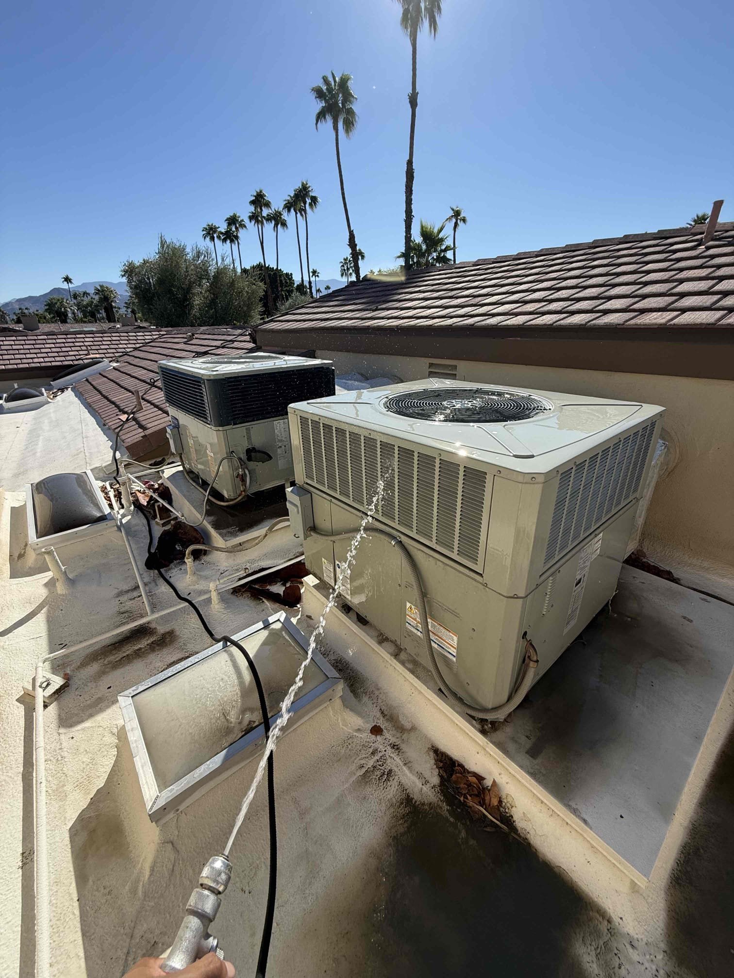 Performed PTU on 2) American Standard package units. Replaced standard lakes filters throughout the house. Followed sequence of operations and checked voltage, condenser fan motor amps, compressor start/run amps, capacitors, temperature split, refrigerant levels, and rinsed condenser coils. Secured all electrical connections. Everything checked out within range. Honeywell 8000 thermostats checked out operational. Both systems are working properly in cooling at this time of service. 