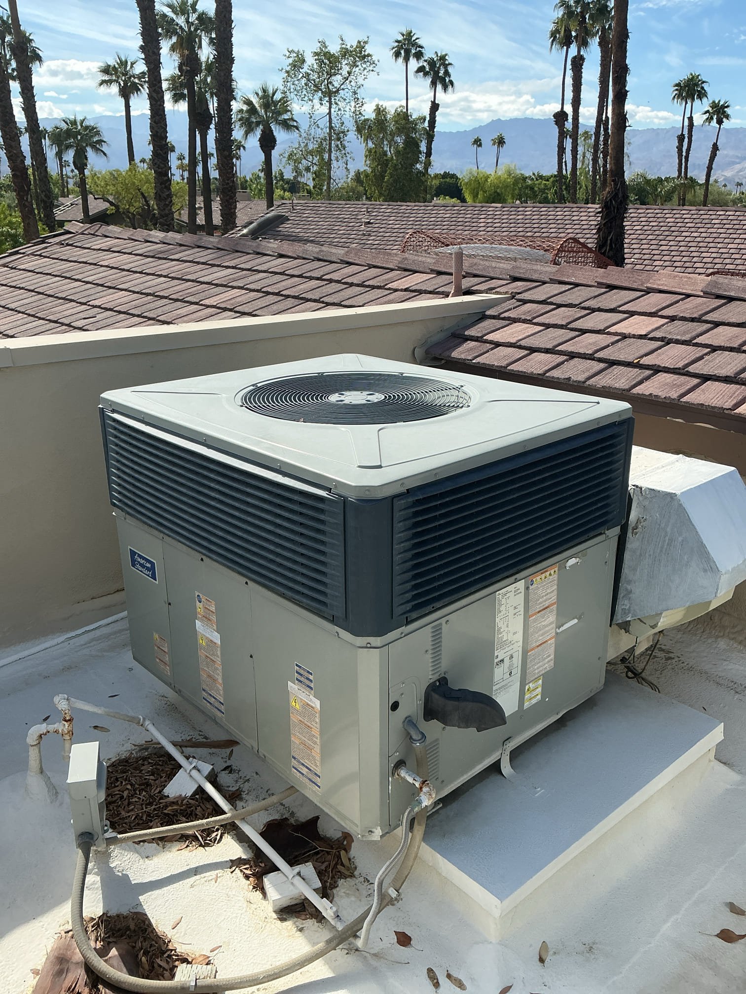 Heating service on 2018 American Standard rooftop package unit and 2022 American standard rooftop package heat pump unit. Changed out standard lakes filters located in ceiling. Cleared all electrical components and burners of dust and debris, verified proper sequence of operation, found starting amps for both within range, cleared condensation lines and washed condensing coil, thermostat checked  systems are now within manufacturers, specifications, and heating and operating properly at this time of service