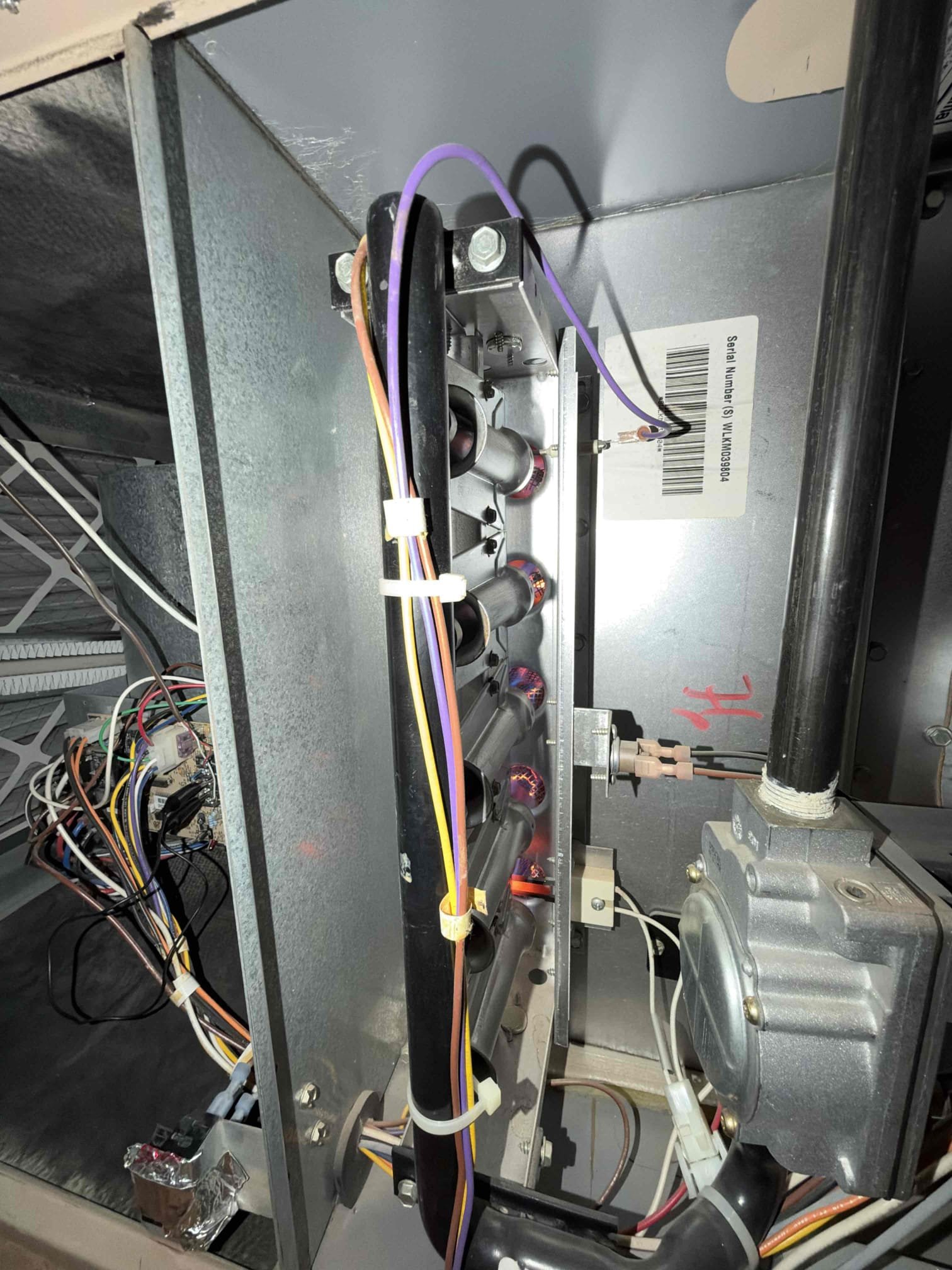 Maintenance on a York 5 ton horizontal split system. Attic access in master bedroom closet. Air purification filtration at furnace. 20 x 25 x 5 customer supply filter. Condensation lines cleared filter changed. Verified UV light working properly. Honeywell thermostat checks out OK. Verified condensate drain draining properly. Check system sequence of operation. Checked inducer fan motor amps, checked pressure suites, checked igniter, checked 24 V on gas valve, checked flame sensor, checked blower motor, checked motherboard, check temperature rise. Verified system is on and heating. System is working at time of maintenance. Client renewed bi-annual maintenance via CC. Gave thank you card to client.