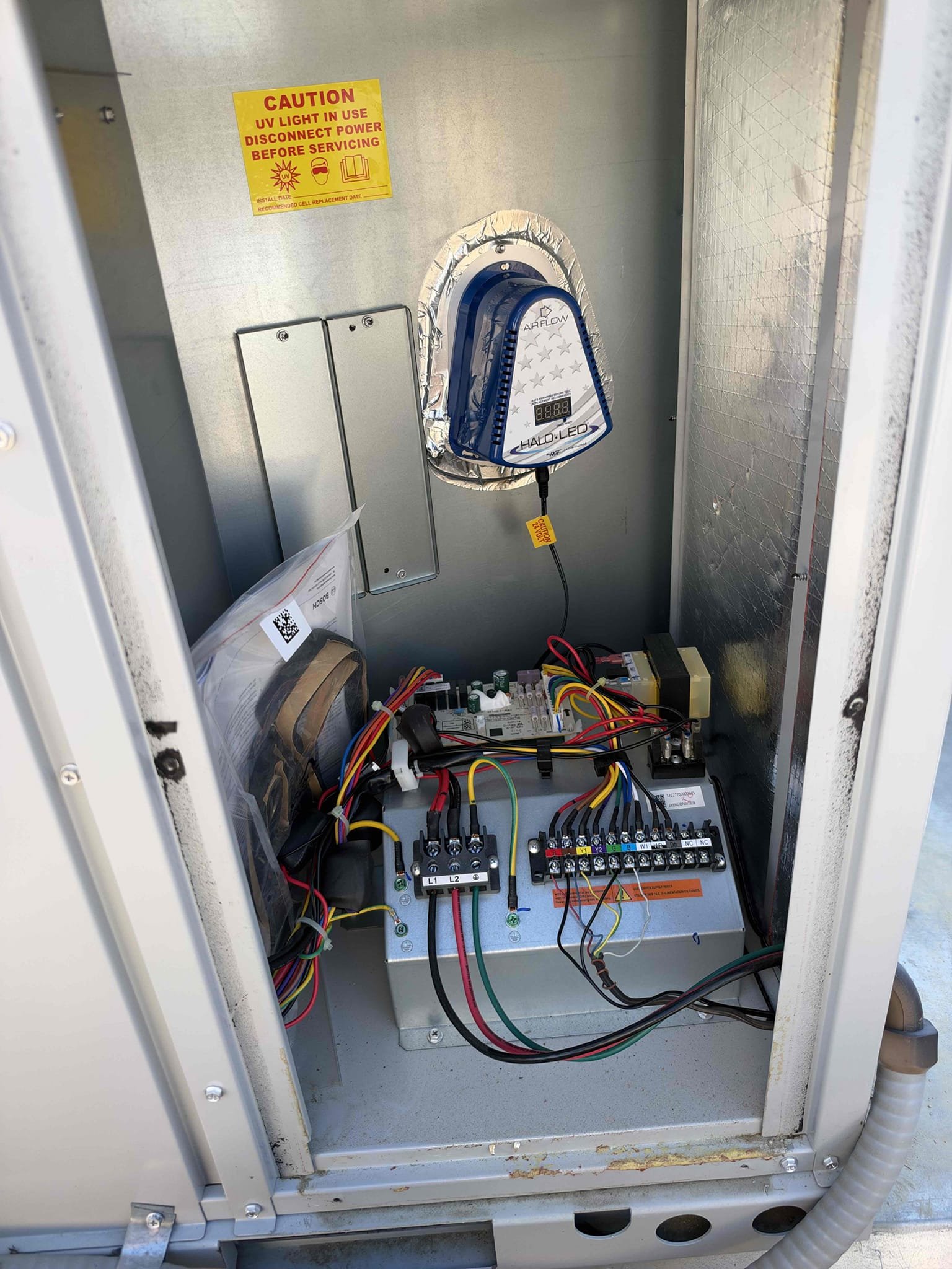 Maintenance on a Bosch 5 ton heat pump package unit. 20 x 20 filter located in hallway next to thermostat. Condensation line cleared filter changed. Nest thermostat working properly. Verified all electrical and safety. Check system sequence of operation. Checked compressor amps, checked fan motor amps, checked fuses and disconnect box, verified system is heating in on two stage. Check temperature rise. All within range and working properly. System is working per manufacture spec. Client had questions about frequently changing filter spoke with client about concerns of indoor air quality. Notified client about Remi Halo air purifier and talked about the benefits an indoor air quality product for home. Client agreed and signed estimate. Installed Reme Halo air purifier verified green light, and system is operational. Client also wanted to sign up for monthly and not bi-annual.