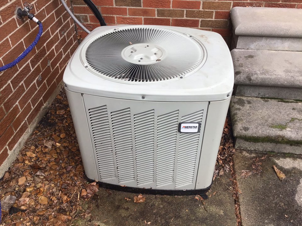 Service on a residential American standard air conditioner in saint Clare shores.