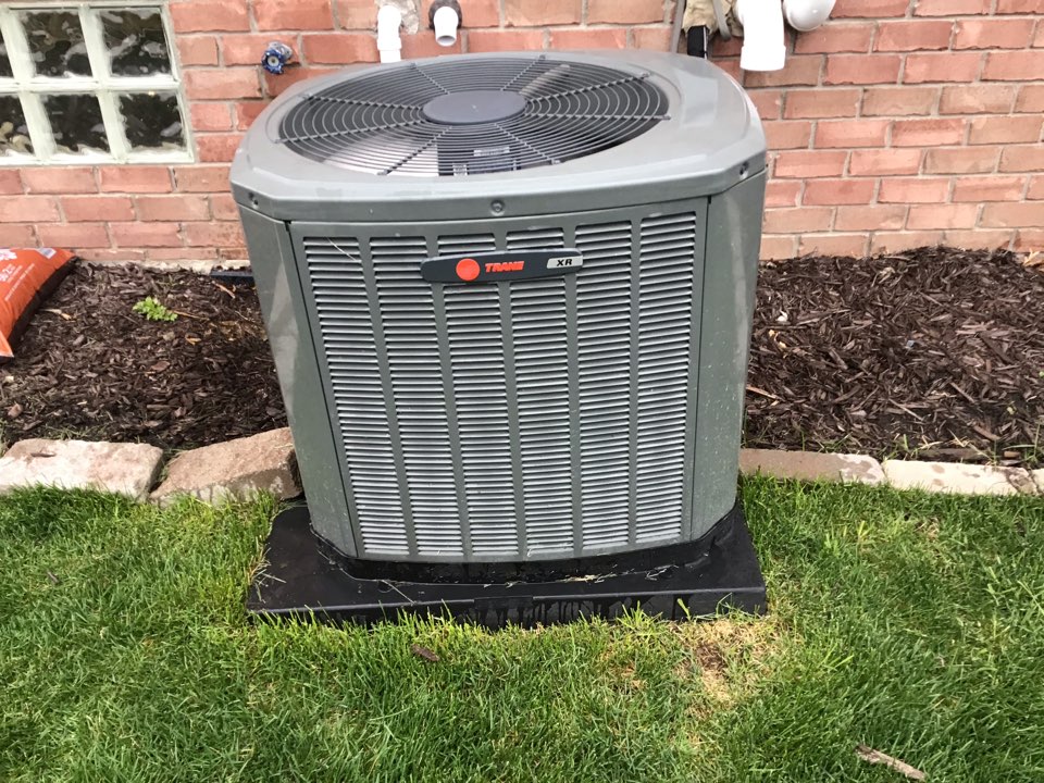 Maintenance on a residential Trane air conditioner in new Baltimore.