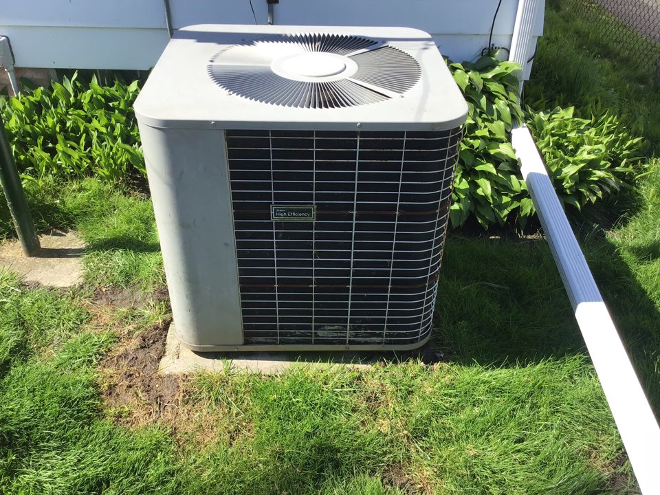 Maintenance on a residential Bryant air conditioner in saint Clare shores.