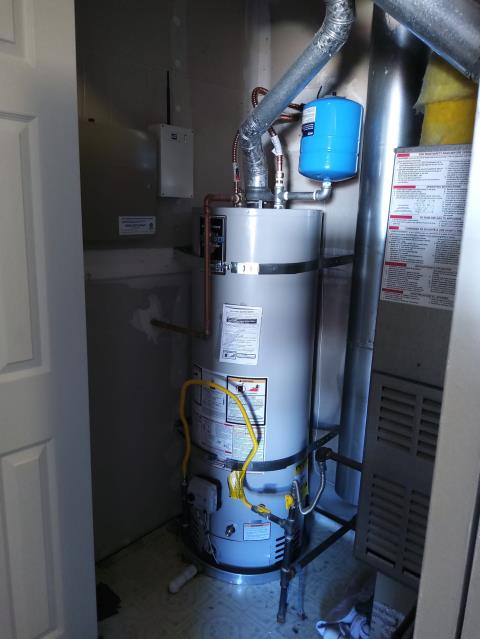 Installed new 40 gallon natural gas water heater.