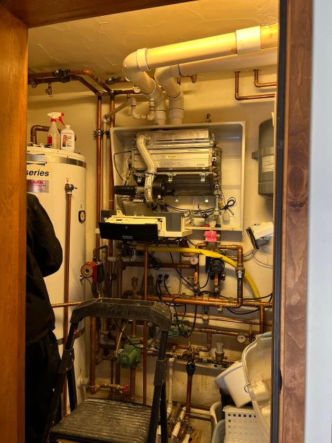  Cleaned off and reinstalled pilot elements on boiler.