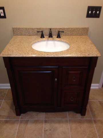 This homeowner finished their own basement with a little plumbing help from us. We had previously roughed in the plumbing and are have now completed the finish work for this basement bathroom that features a shower, 36" vanity, and Kohler toilet. 