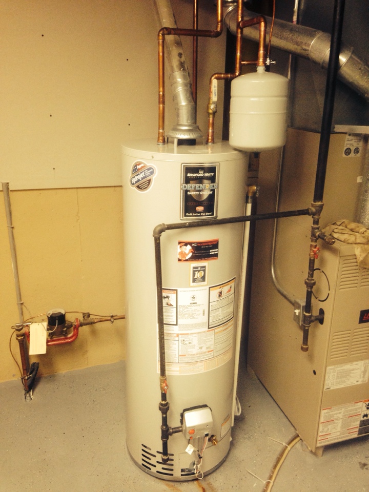 Install 10 year Bradford White 50 gallon water heater with expansion tank.